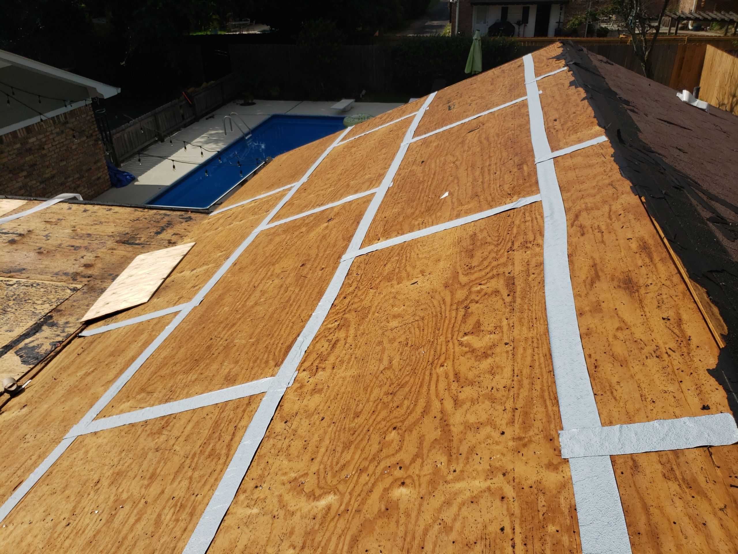 Residential Roofing Installation using Roof Replacement by American Roofing & Construction LLC