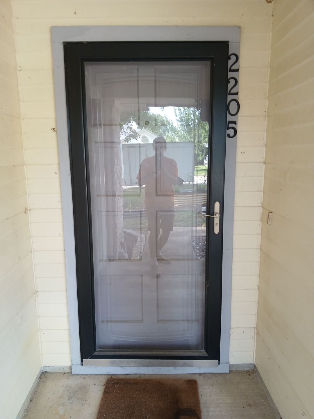 Custom Exterior Door Installation with Modern Glass Panes in Wells Branch Austin by RejuveNate Renovations LLC