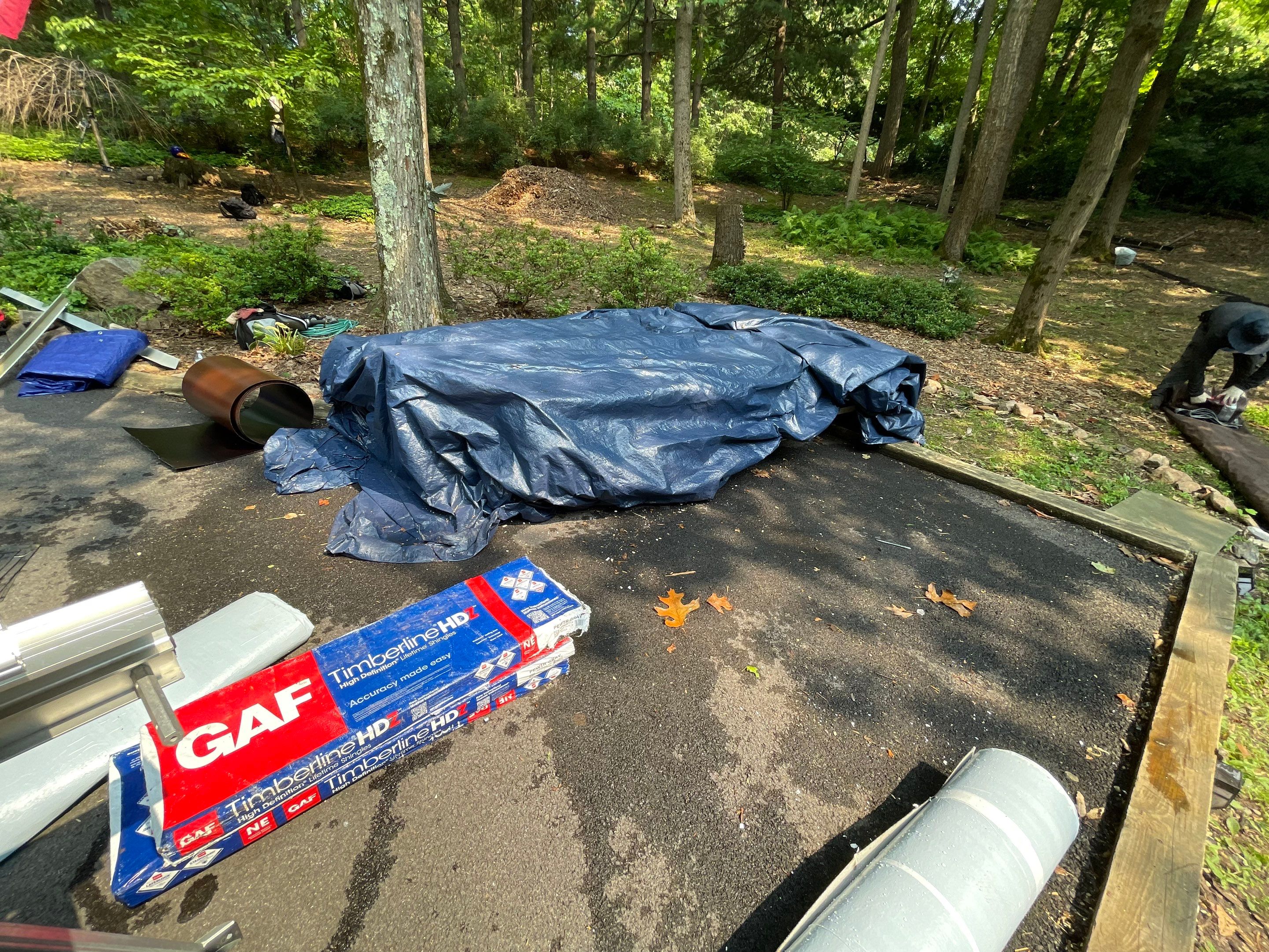 Deckhouse Roof Replacement by American Home Contractors