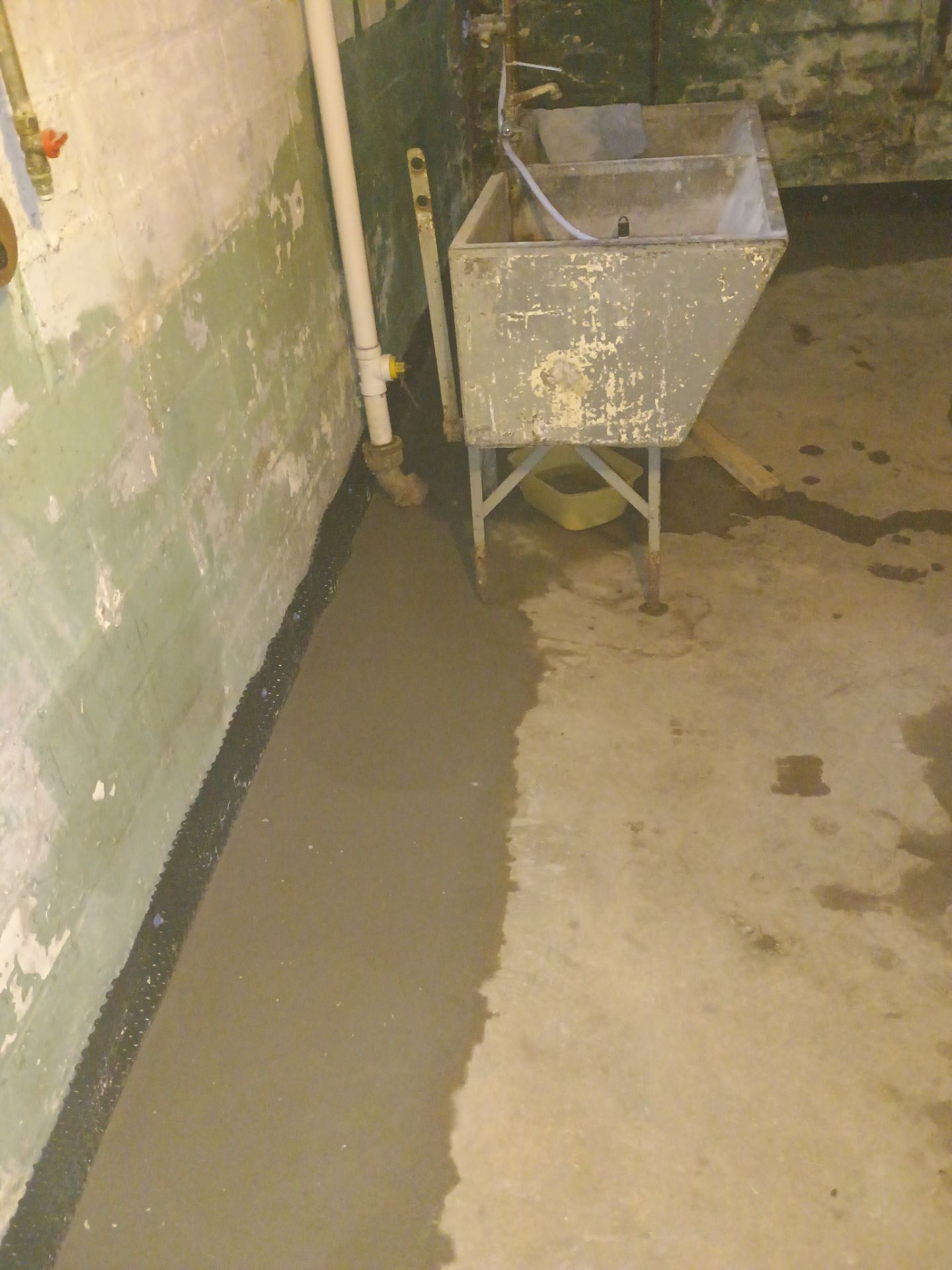 Interior Drain Tile for a South Minneapolis Basement by Waterproofing Northeast