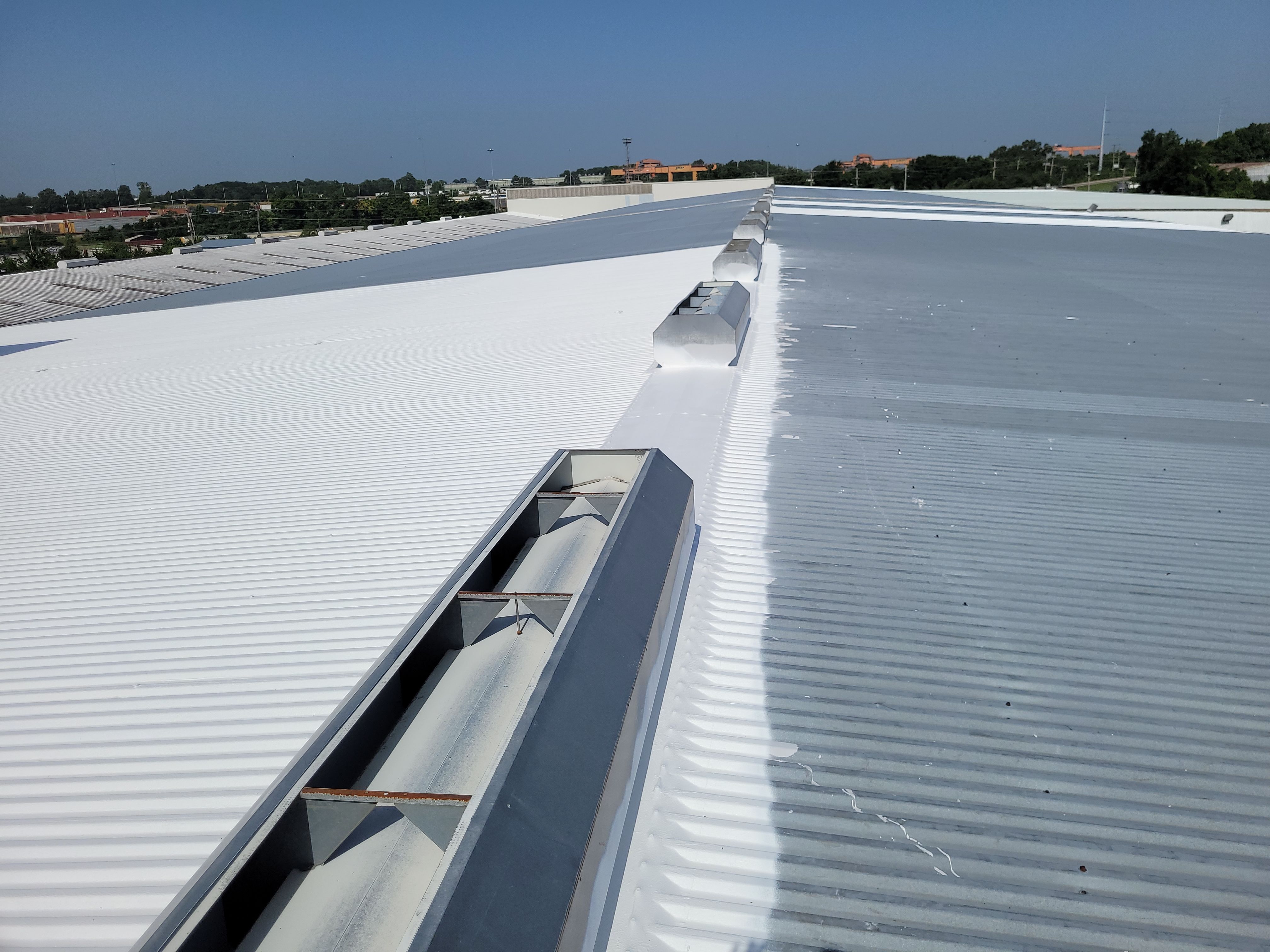 Commercial Metal Restoration System using Aldocoat Coatings by Hostetler Roofing