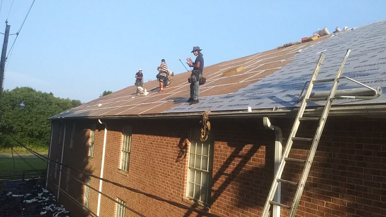 Residential Roofing Installation using Roof Replacement by American Roofing & Construction LLC