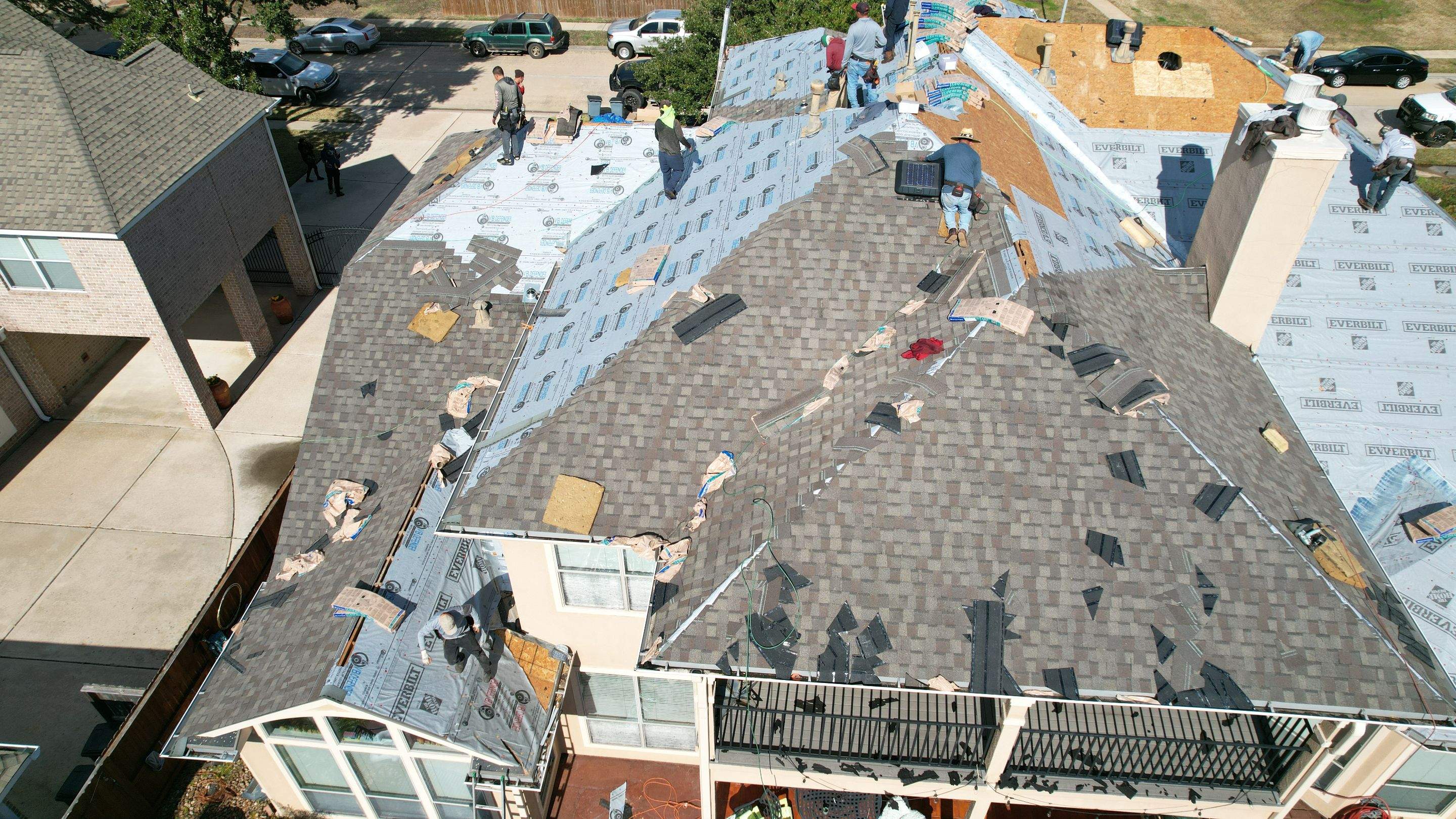 Two-Story Roof Replacement & Chimney Stucco Repair — Houston, TX by PL Roofing & SB Roofing, LLC.