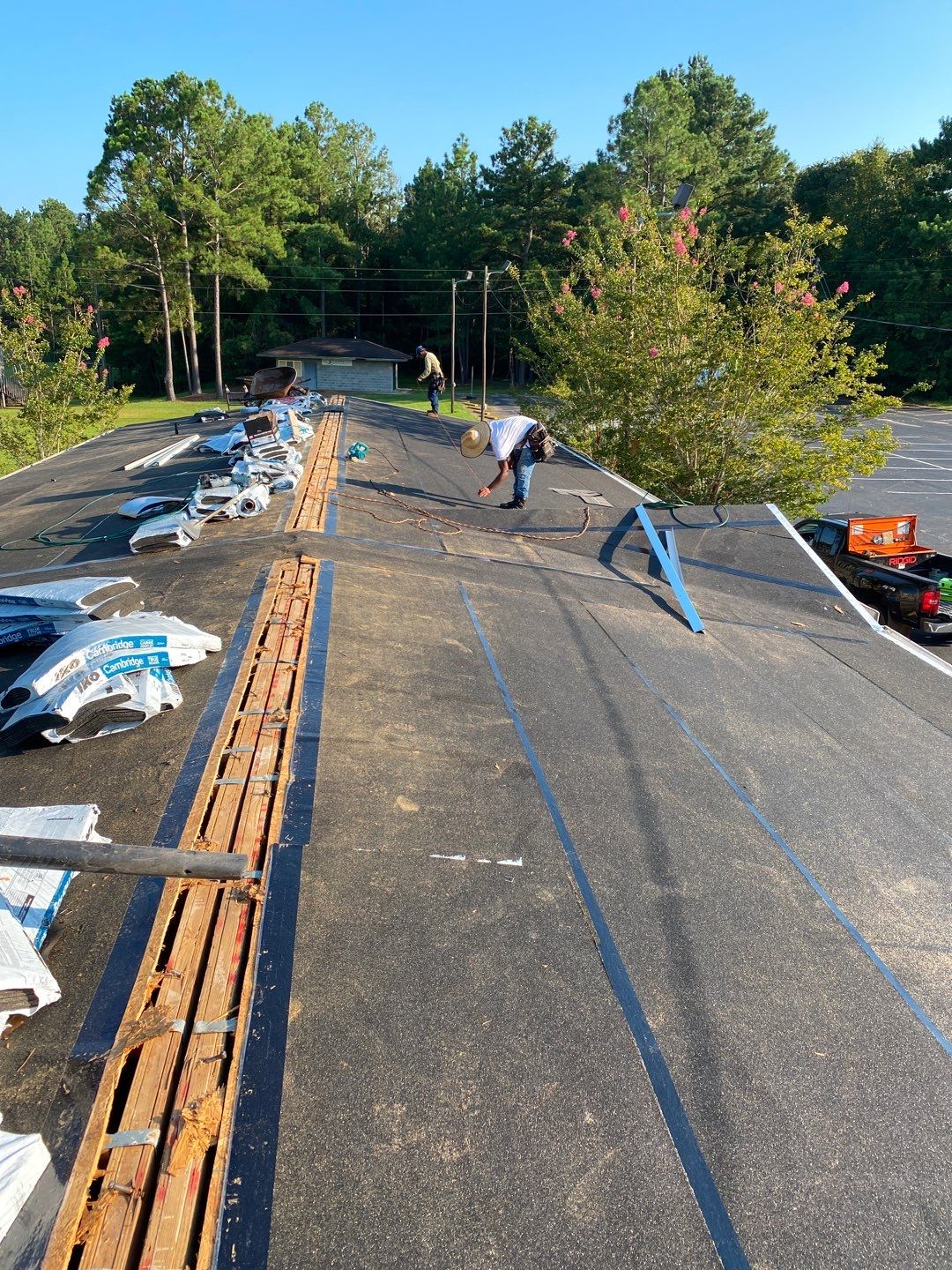 Commercial Roofing Installation using Roof Replacement by American Roofing & Construction LLC