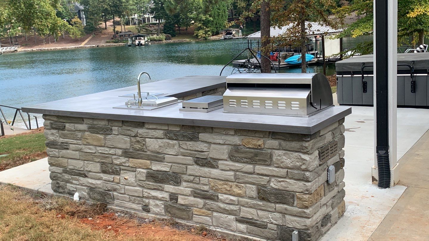 Outdoor Kitchen on Lake Keowee by Xtreme Concrete Services