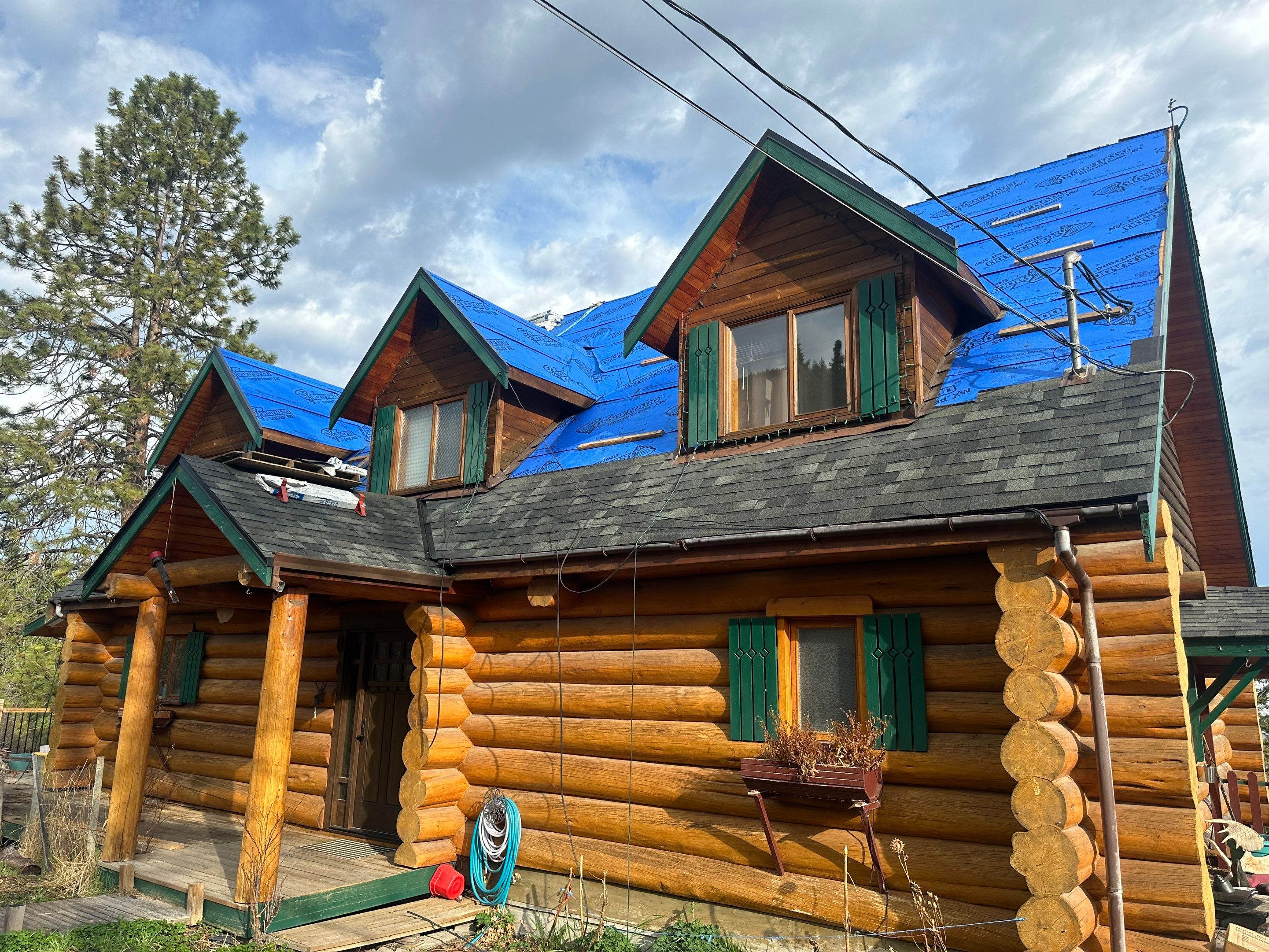 Residential Cedar ReRoofing using Malarky Vista shingles by Top Notch Roofing Inc