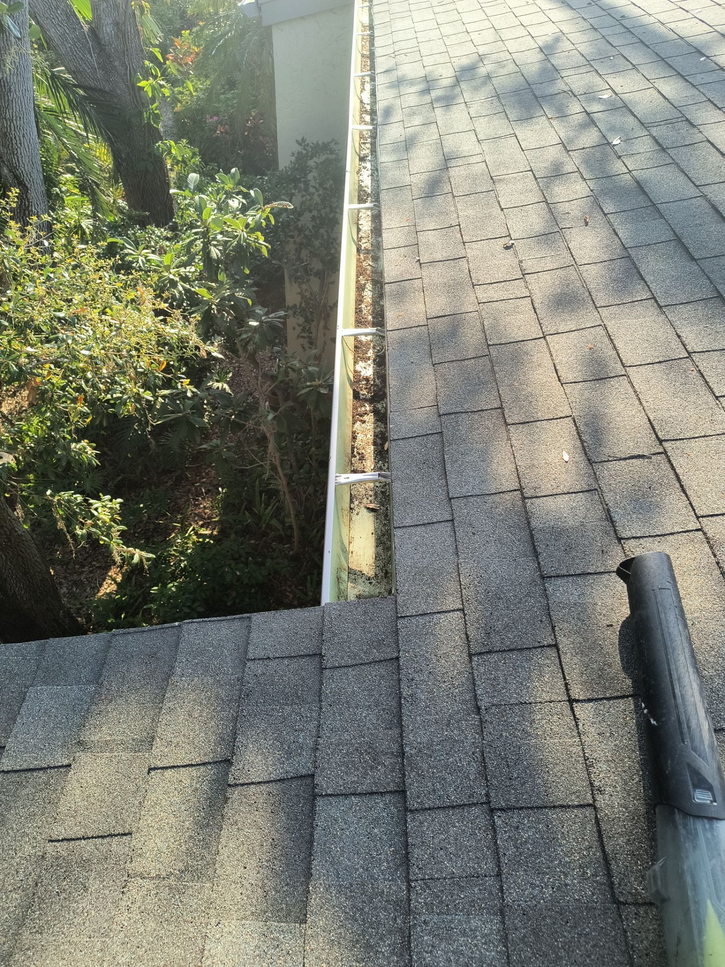 Professional Gutter cleaning Aluminum Seamless Gutters  in Sarasota FL by Gutter Professors
