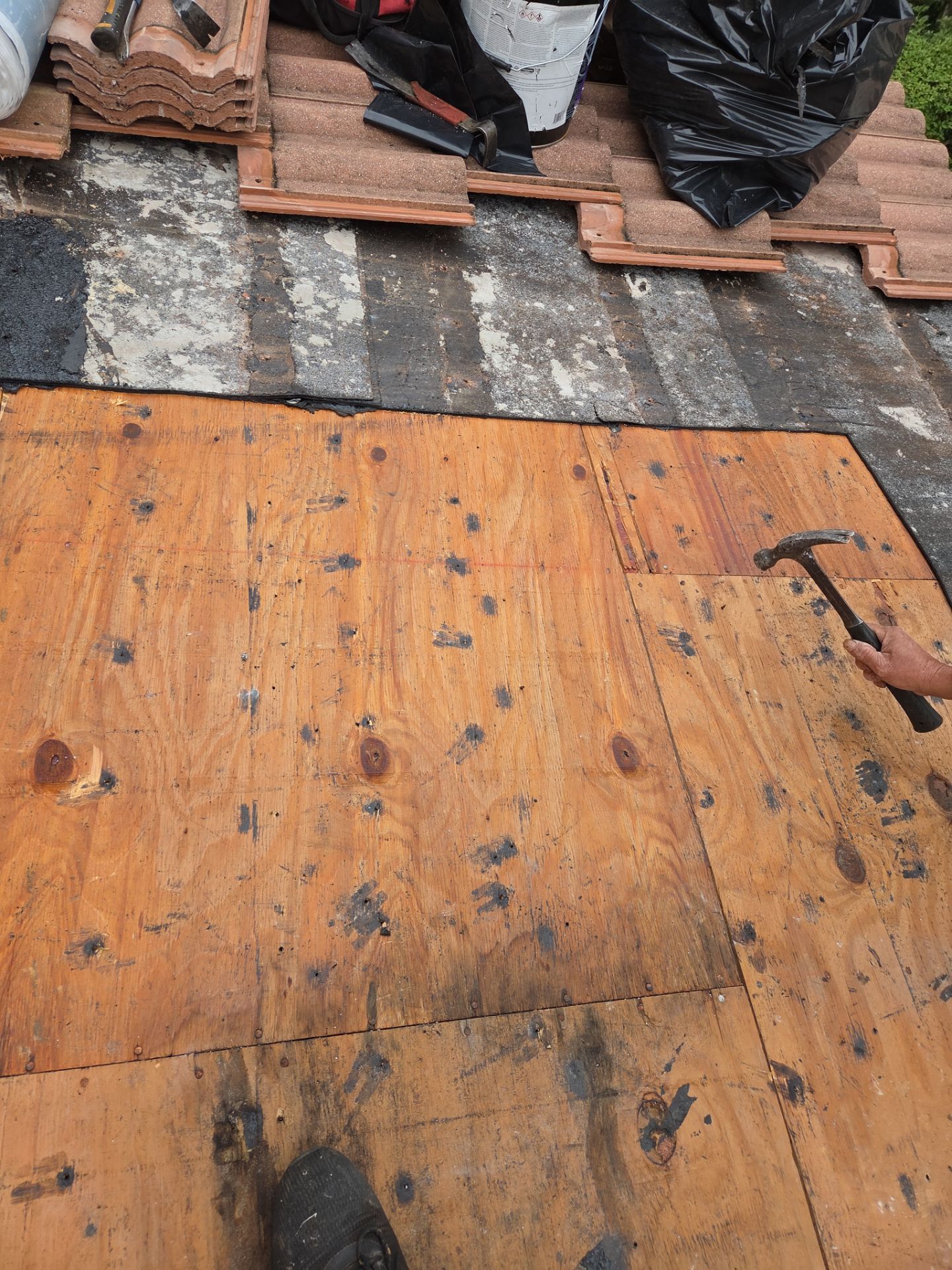 Clay Tile Roof Repair and Decking Replacement in Boynton Beach by Aastro Roofing