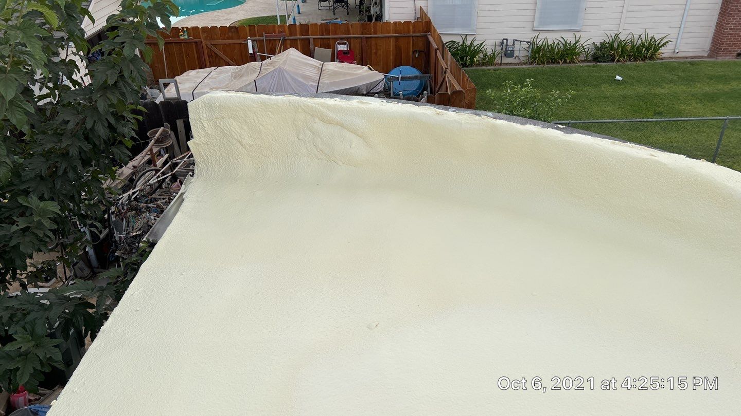 Residential Roofing Installation using Spray foam roofing insulation and General Coatings acrylic coatings by Straight Edge Roofing Inc