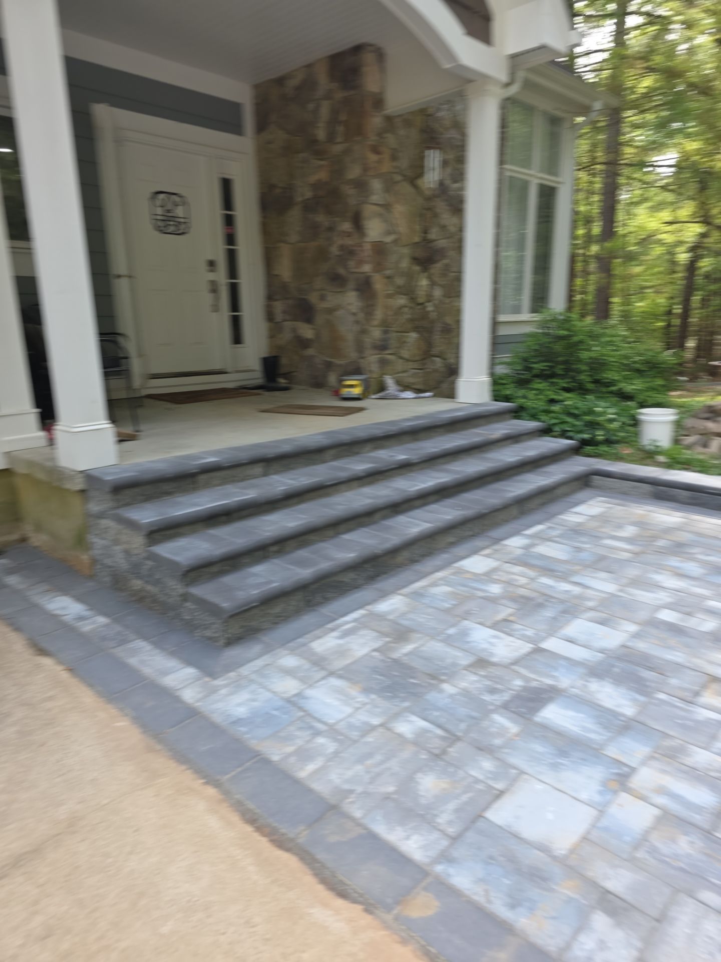 Pittsboro Outdoor Living Transformation – Retaining Wall, Paver Patio & Elevated Deck by Elite Remodeling and Design LLC
