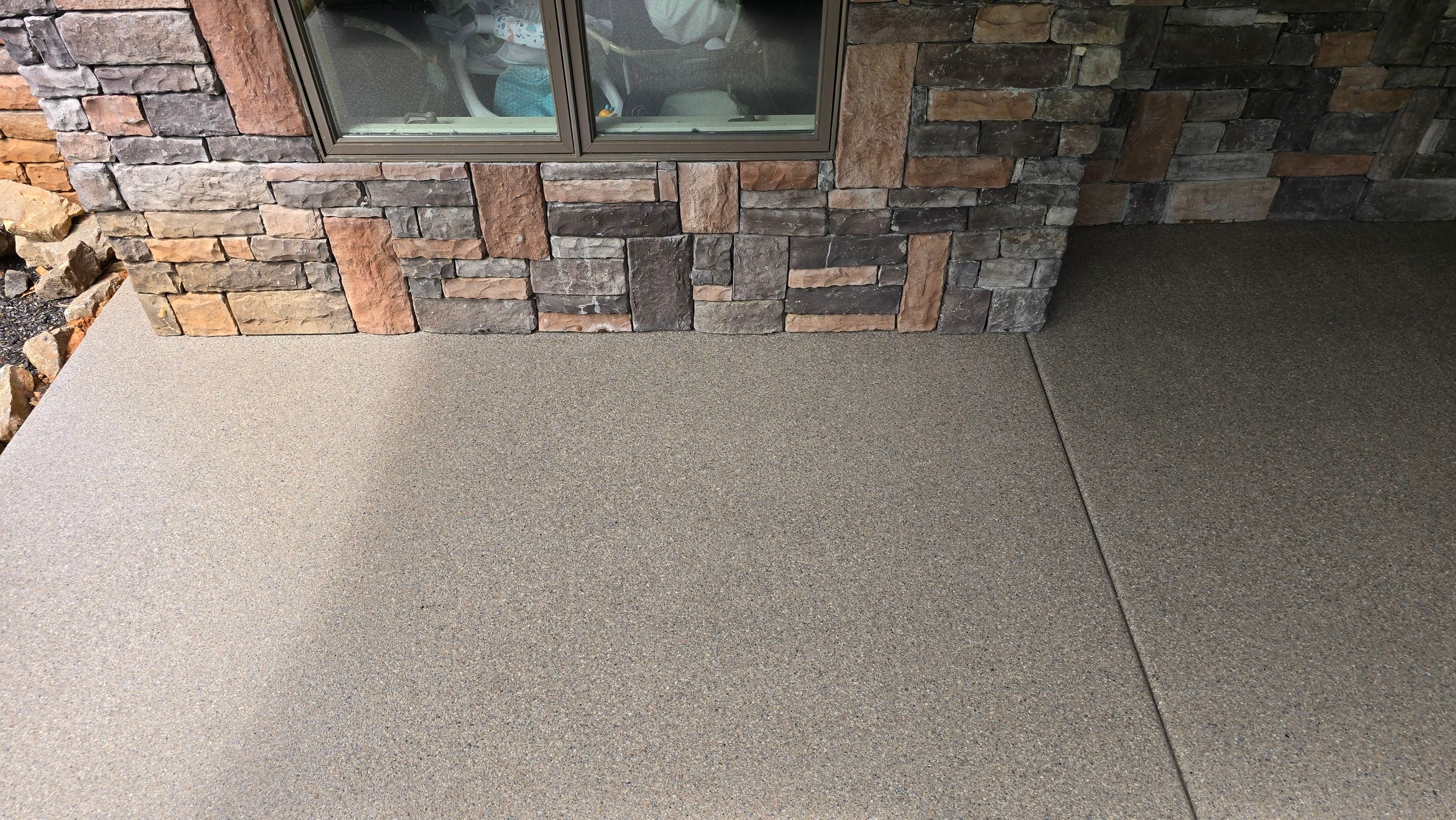Patio using Obsidian by Elite Floor Solutions