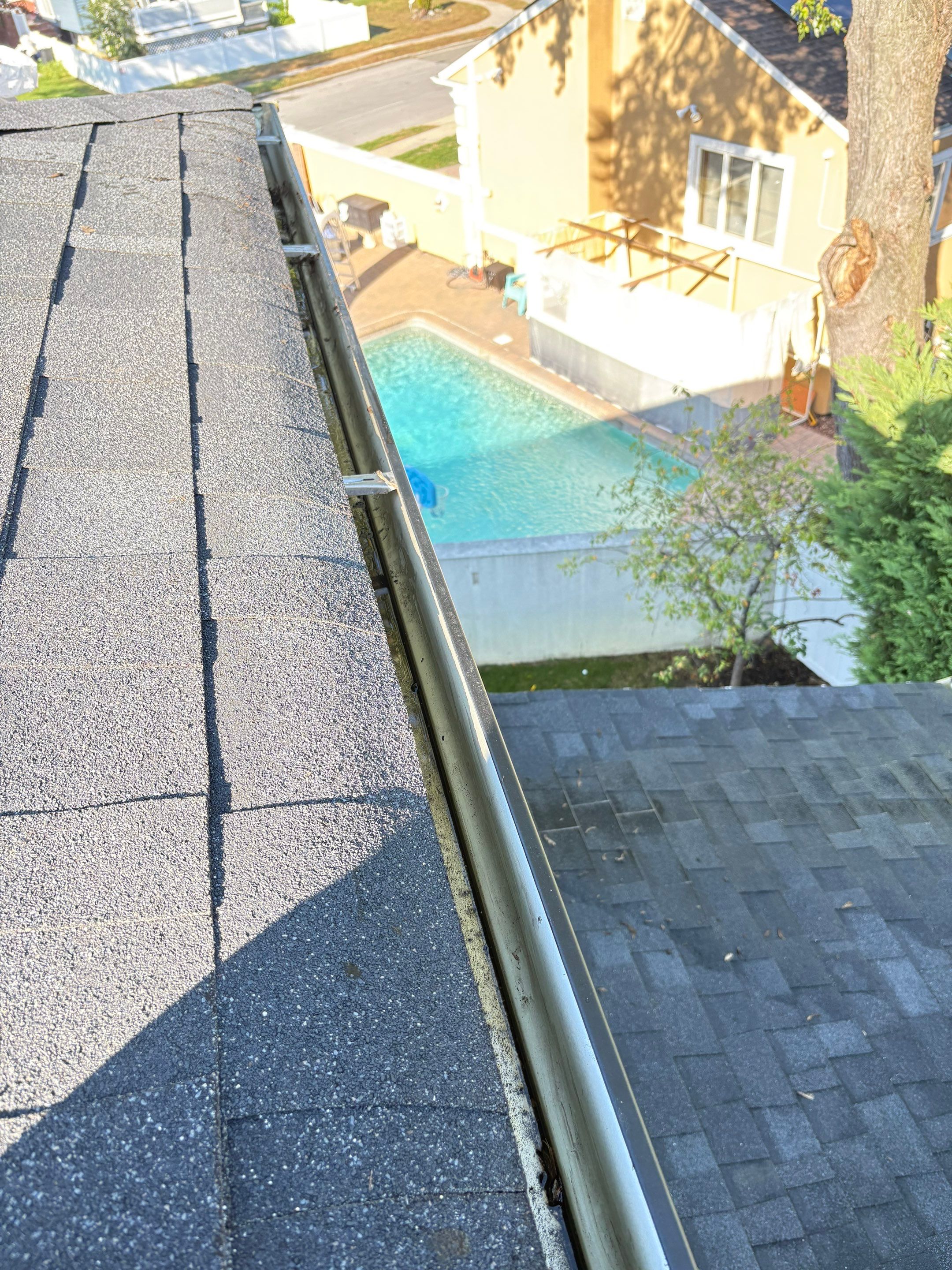 Gutter Cleaning N Woodmere by Above All Gutters 
