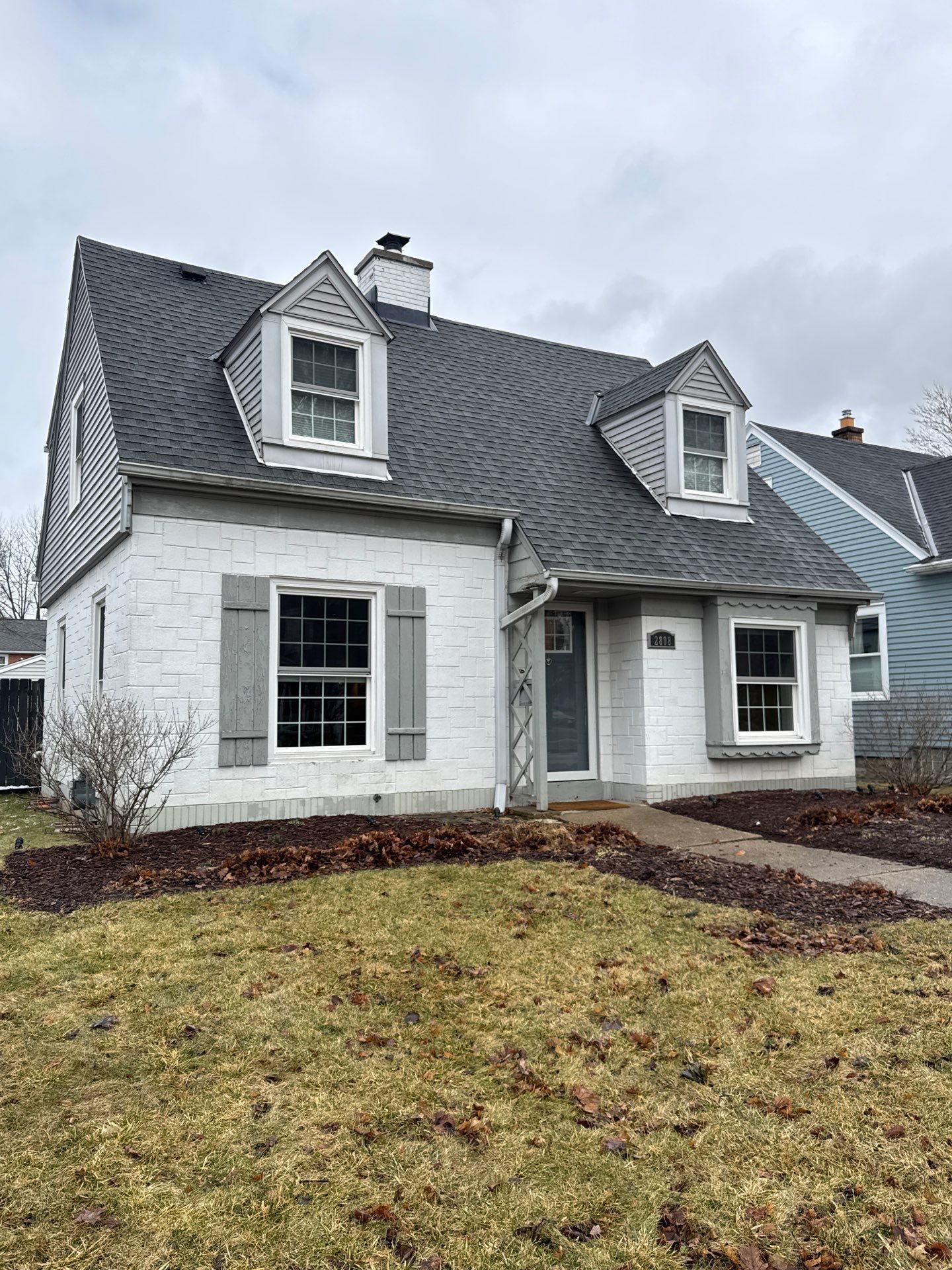 Milwaukee Cape Cod Exterior Renovation and Siding Replacement by OCS Contracting Services