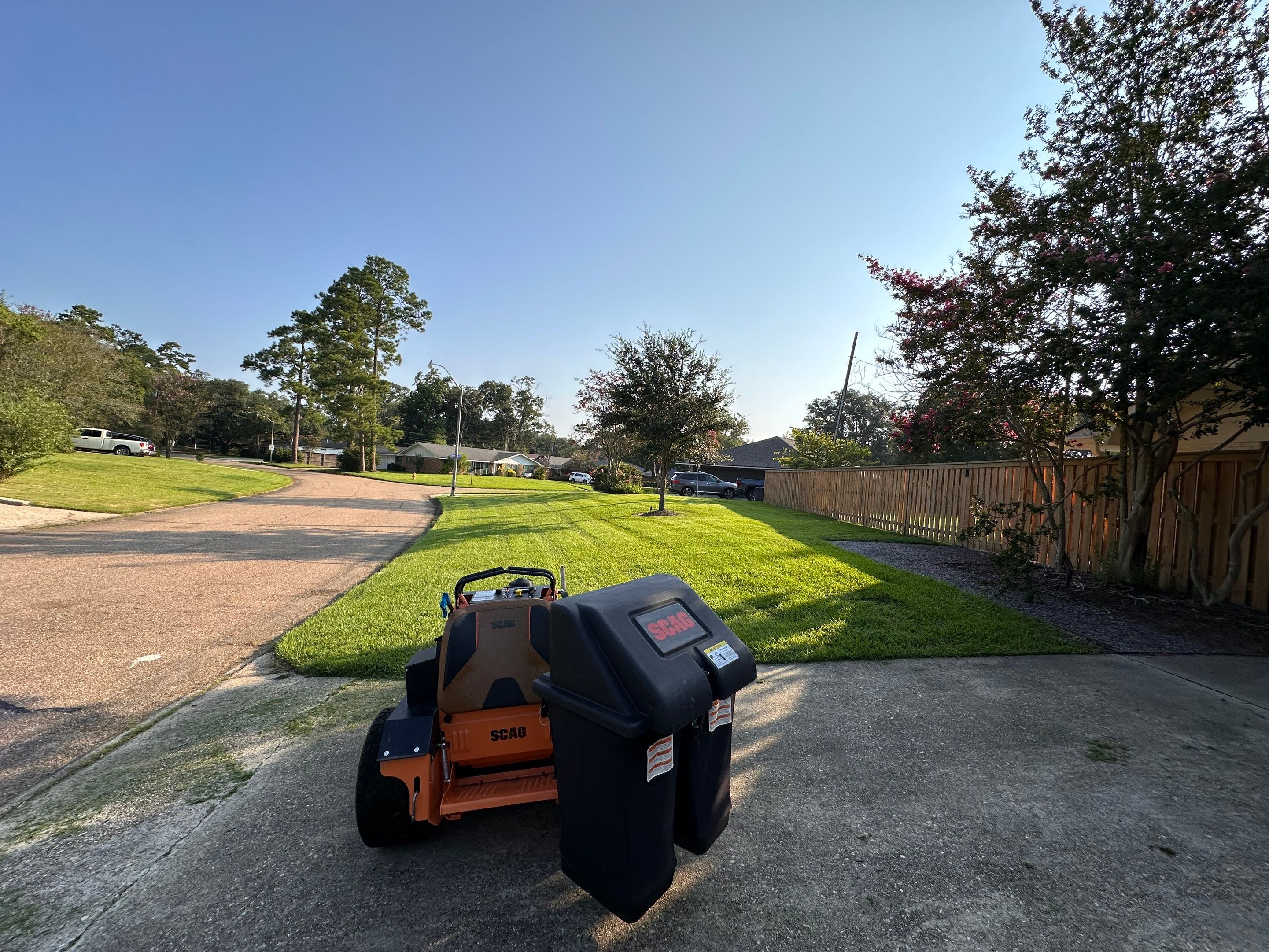 RESIDENTIAL LAWN MAINTENANCE: *OPTIONAL* VAC & BAG GRASS CLIPPINGS AND DEBRIS WITH SCAG GRASS CATCHERBAGGING GRASS CLIPPINGS AND DEBRIS WITH SCAG GRASS CATCHER by CutScape, LLC.