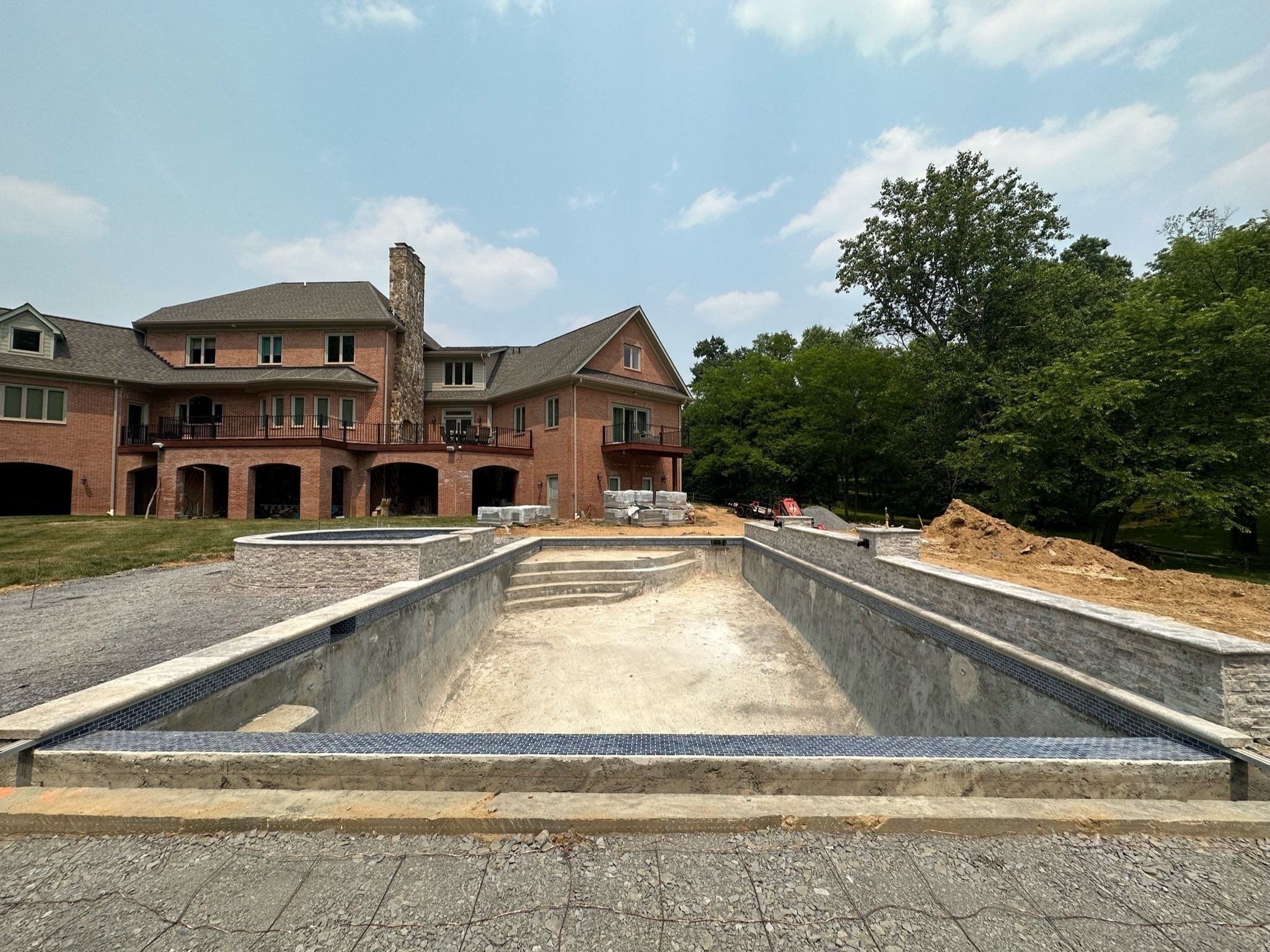 Gunite Pool w/ Spa and Water Features  by Elysium Pools