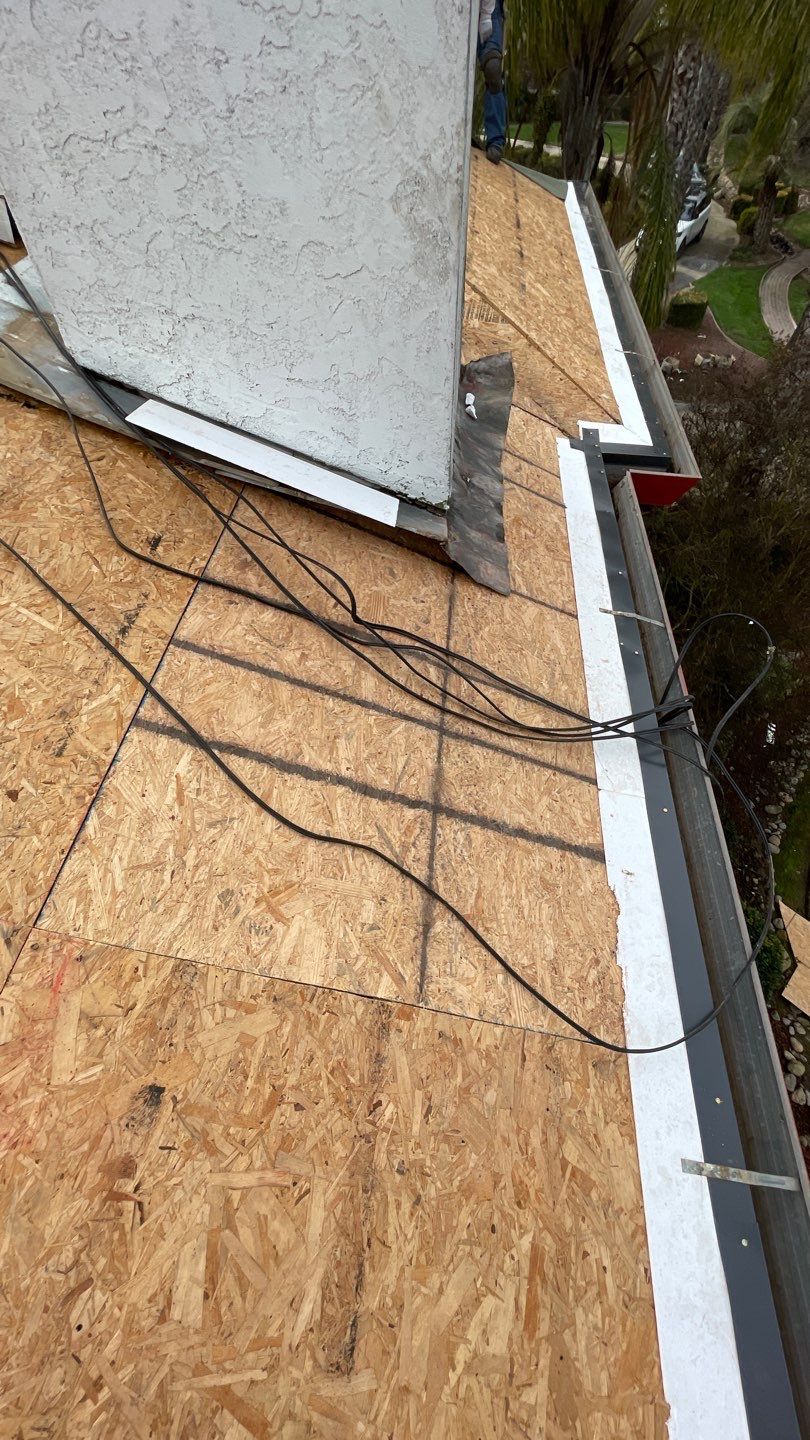 Tile refurbish project using existing tiles and replaced underlayment and battens by Straight Edge Roofing Inc