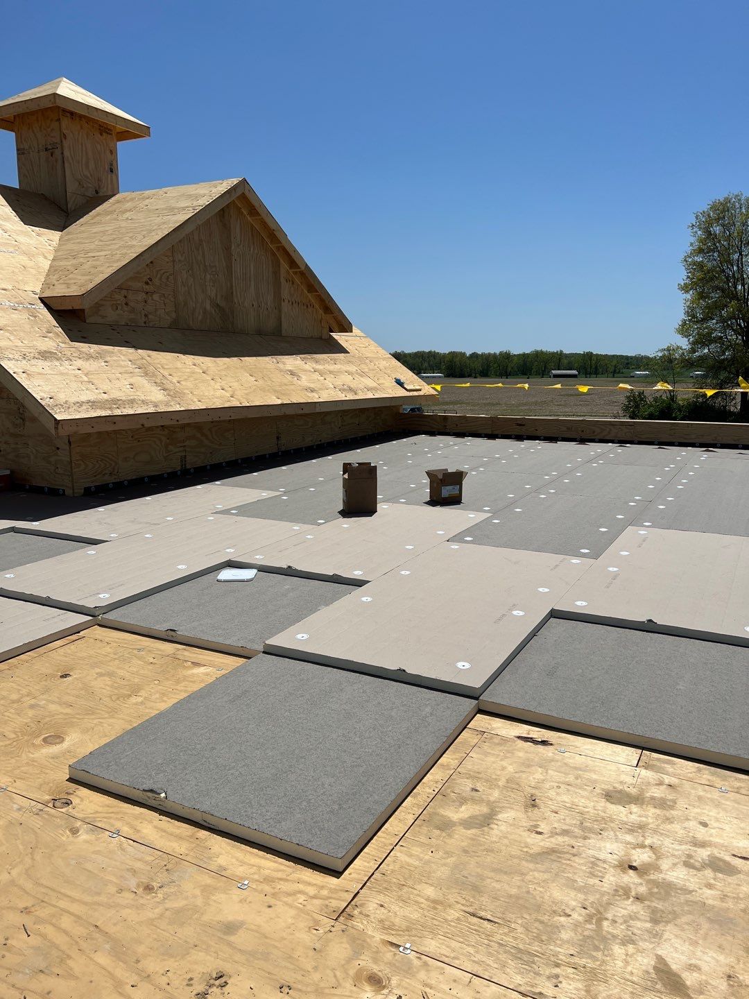 Commercial Roofing Installation using 60 mil rubber roof  by Nitro Roofing and Construction