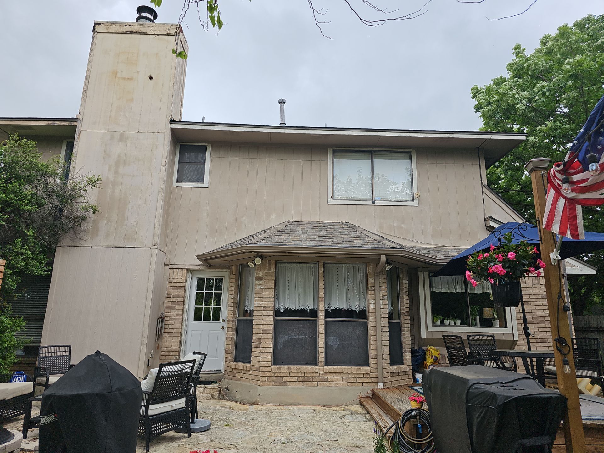 Siding Makeover  by DeZign Roofing & Exteriors