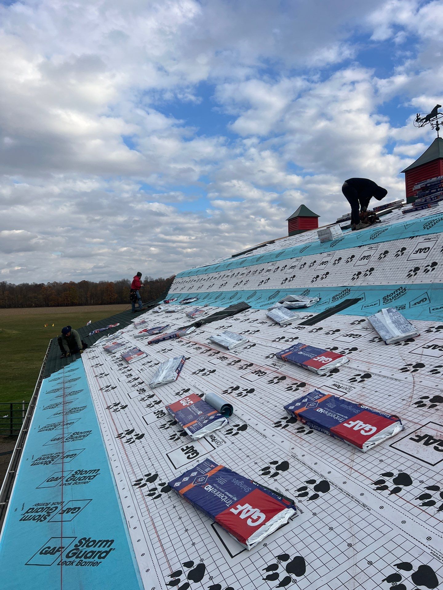 Residential Roofing Replacement with Multiple Skylights in Mason, Michigan by Acme Exteriors