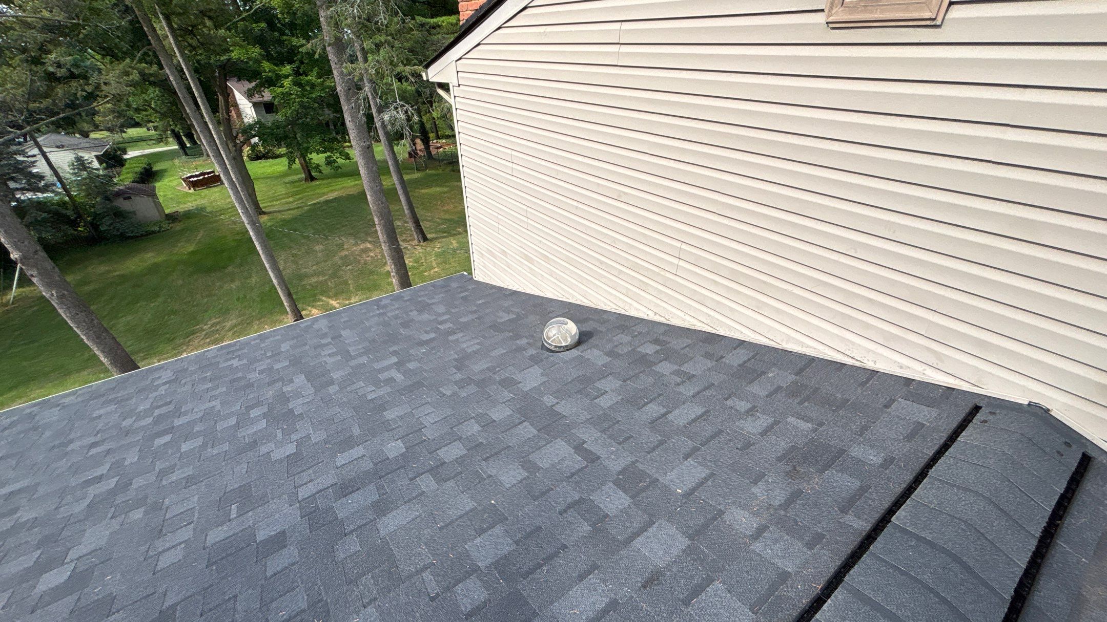 Roof Replacement using Owens Corning Onyx Black by 180 Contractors