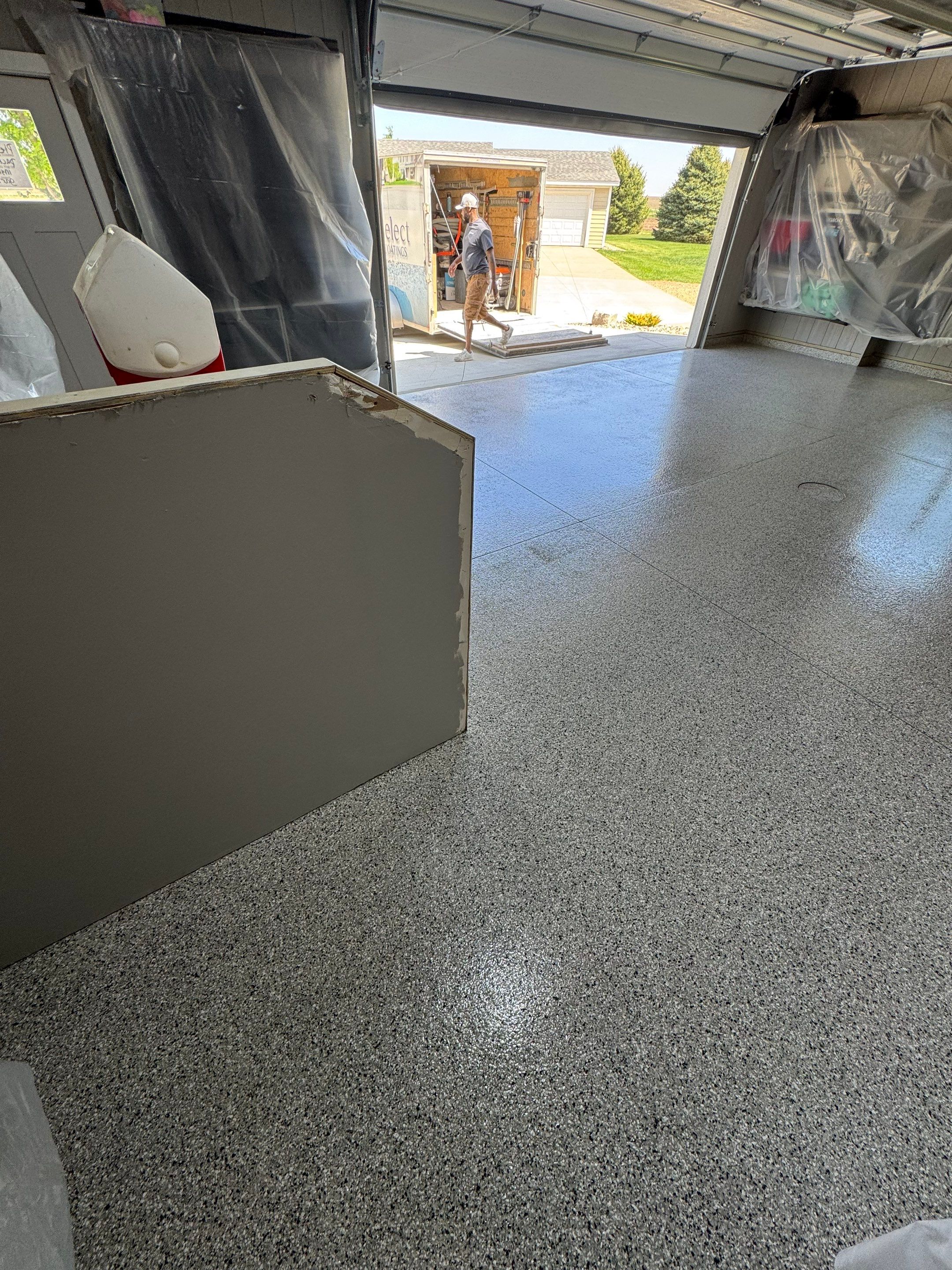 High-Gloss Grey Epoxy Floor Coating for Inwood Garage by Select Painting, Coatings & Garage Cabinets