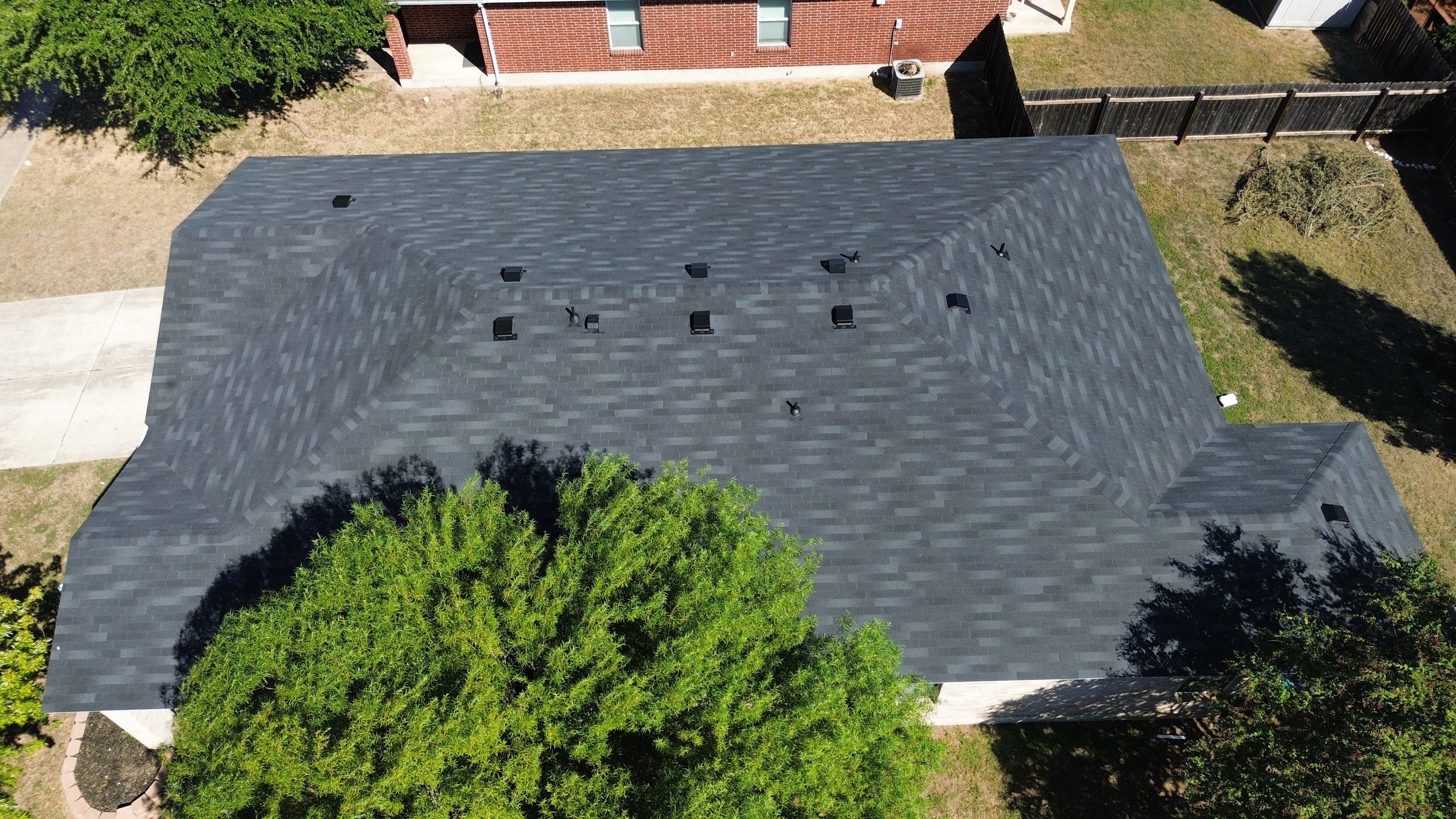 Residential Roof Installation ā Supreme Onyx Black | Leander, TX by Kstylez Roofing & Construction