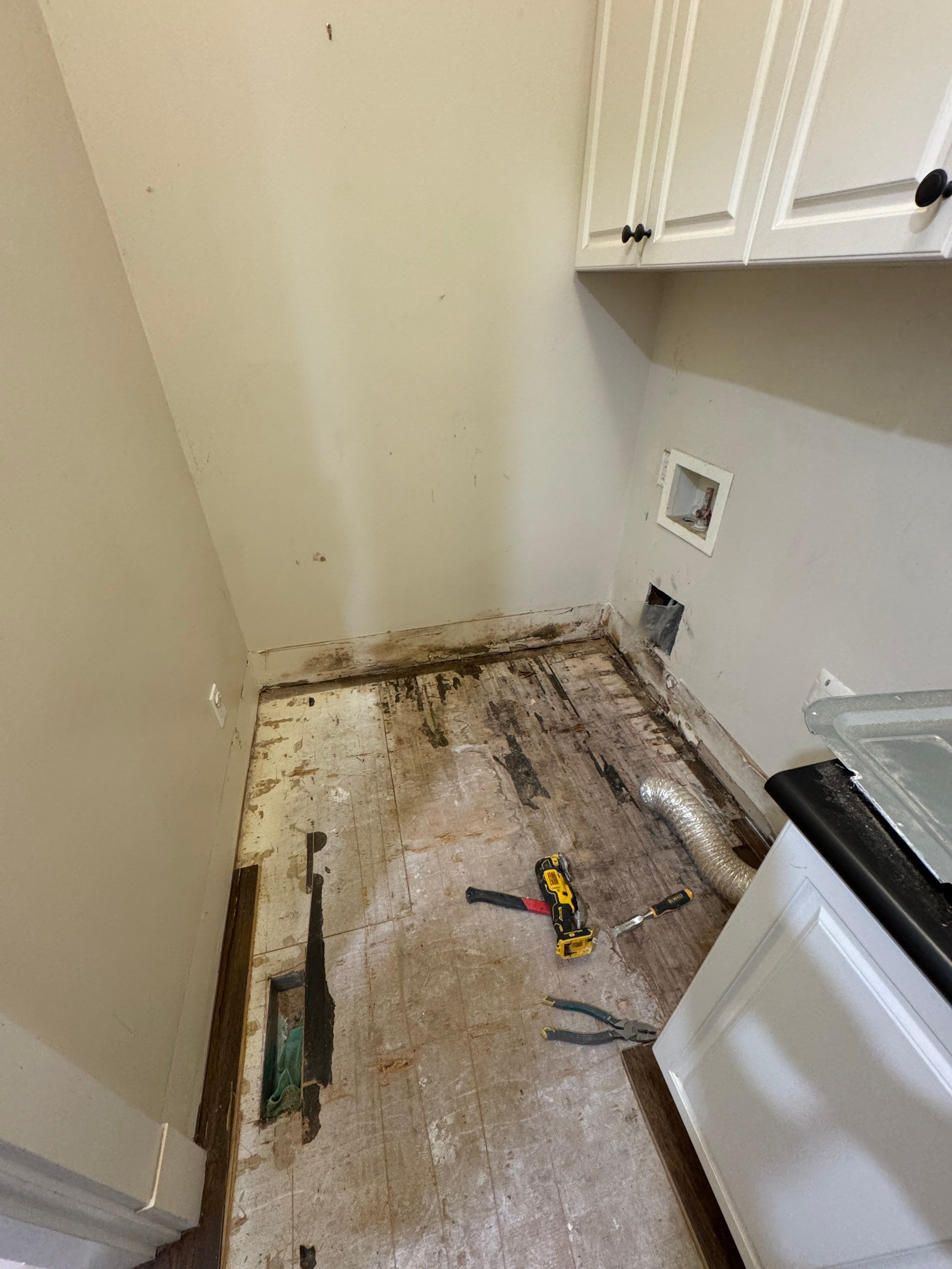 High-End Laundry Room Renovation and Restoration in Vancouver by YVR Construction Group