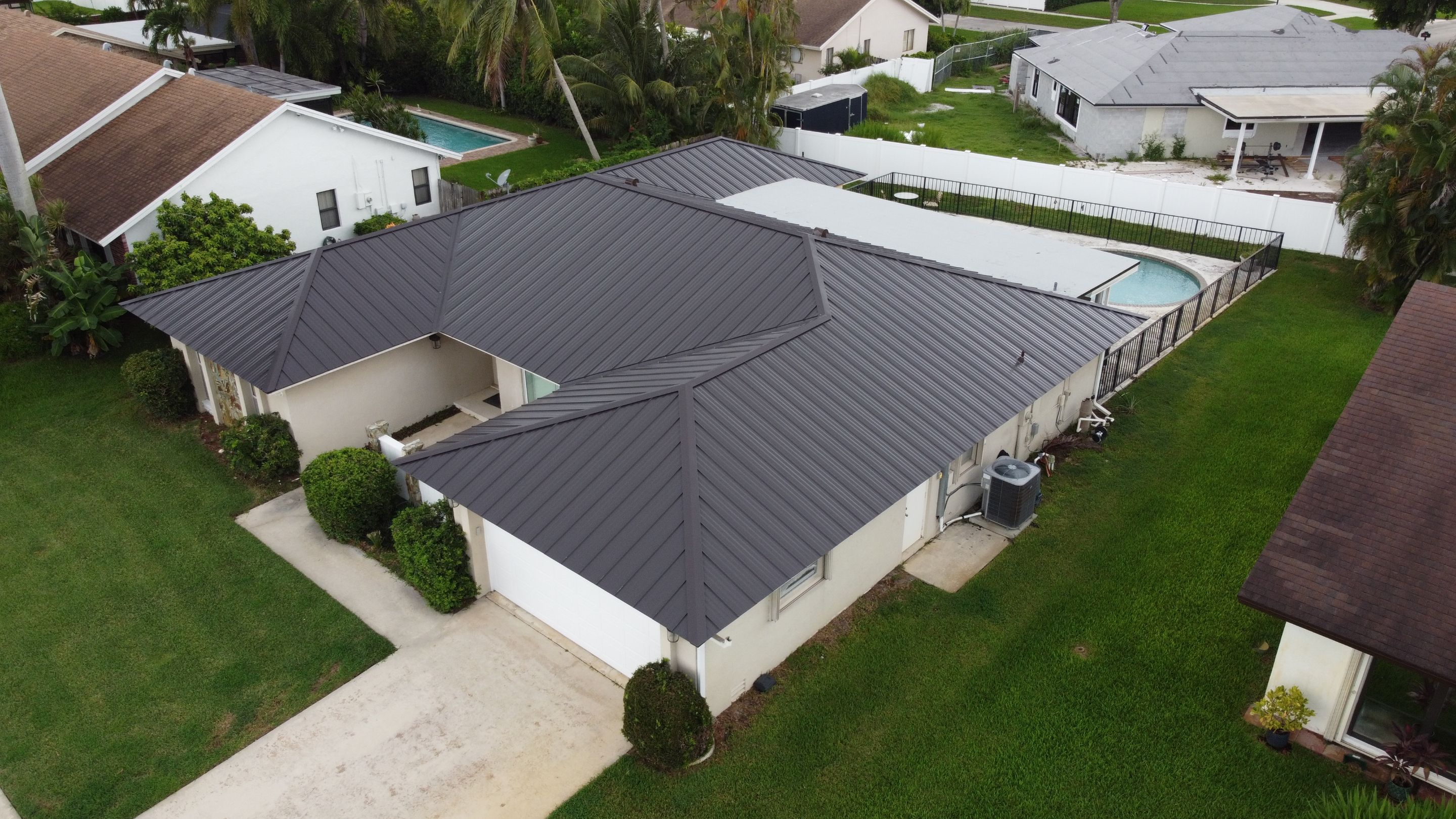 Residential Roofing Installation using 1" Nail strip metal roof by BLUES BROTHERS CONSTRUCTION CORP