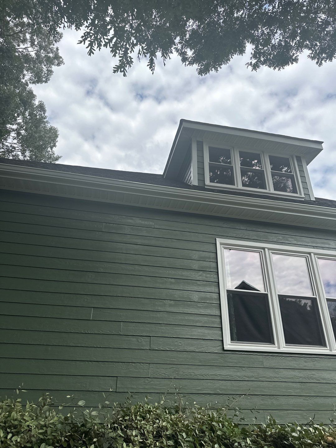 Raleigh Siding and Window Replacement with Custom Green Finish by The Remodeling Company