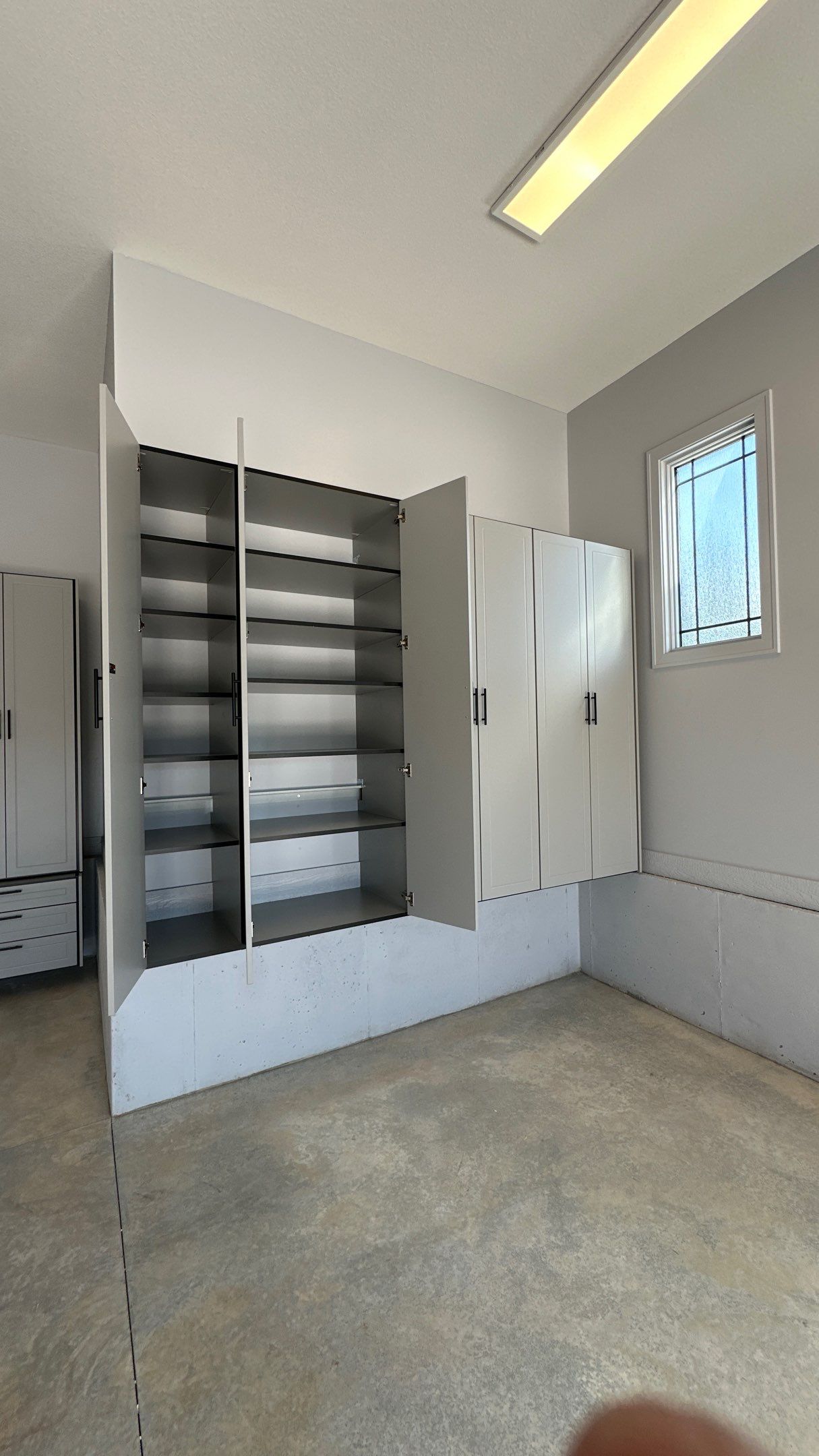 Tom S. made storage a priority in his garage  by Banner Garage