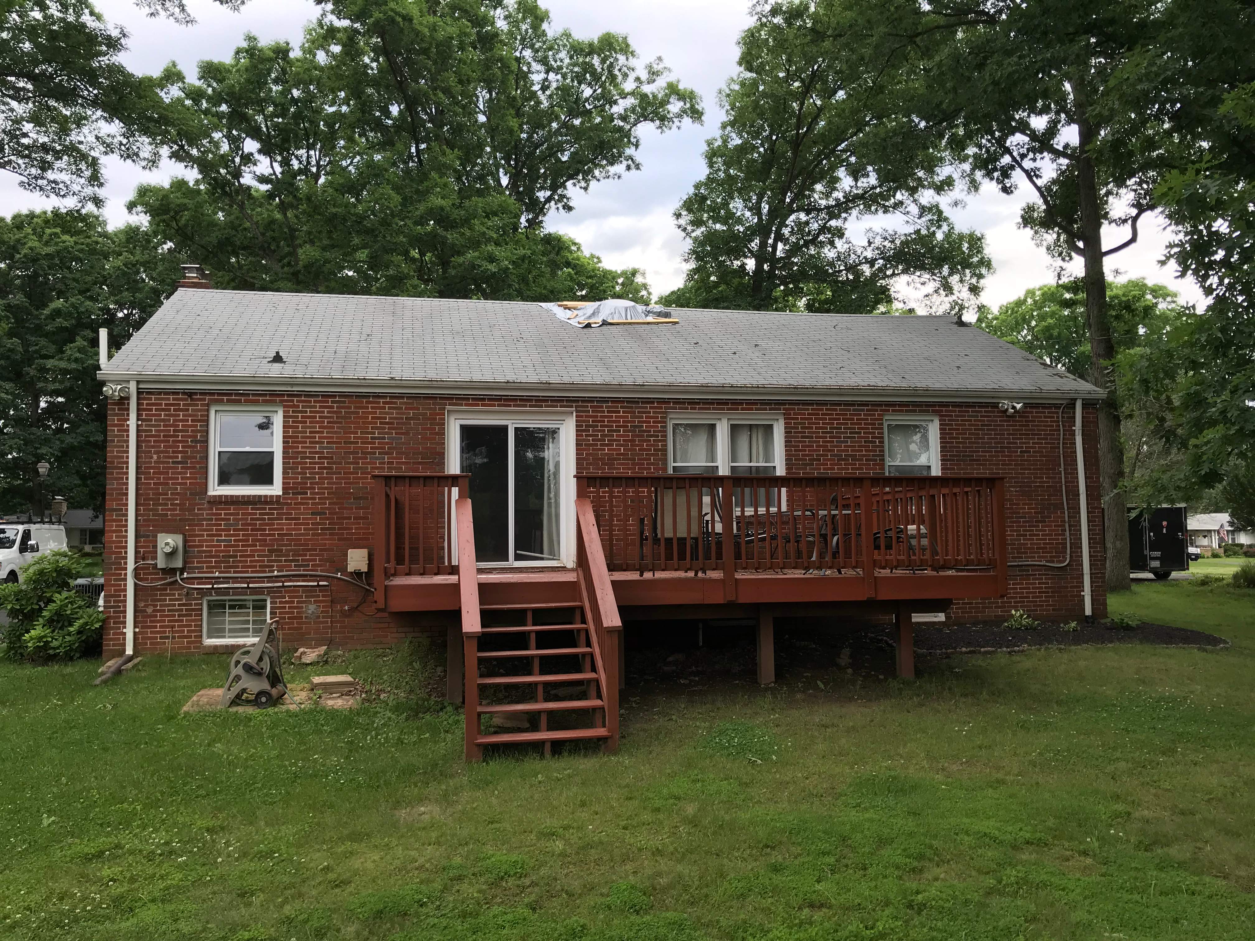 Residential Roofing Installation using Charcoal Black by Alpha Design Services