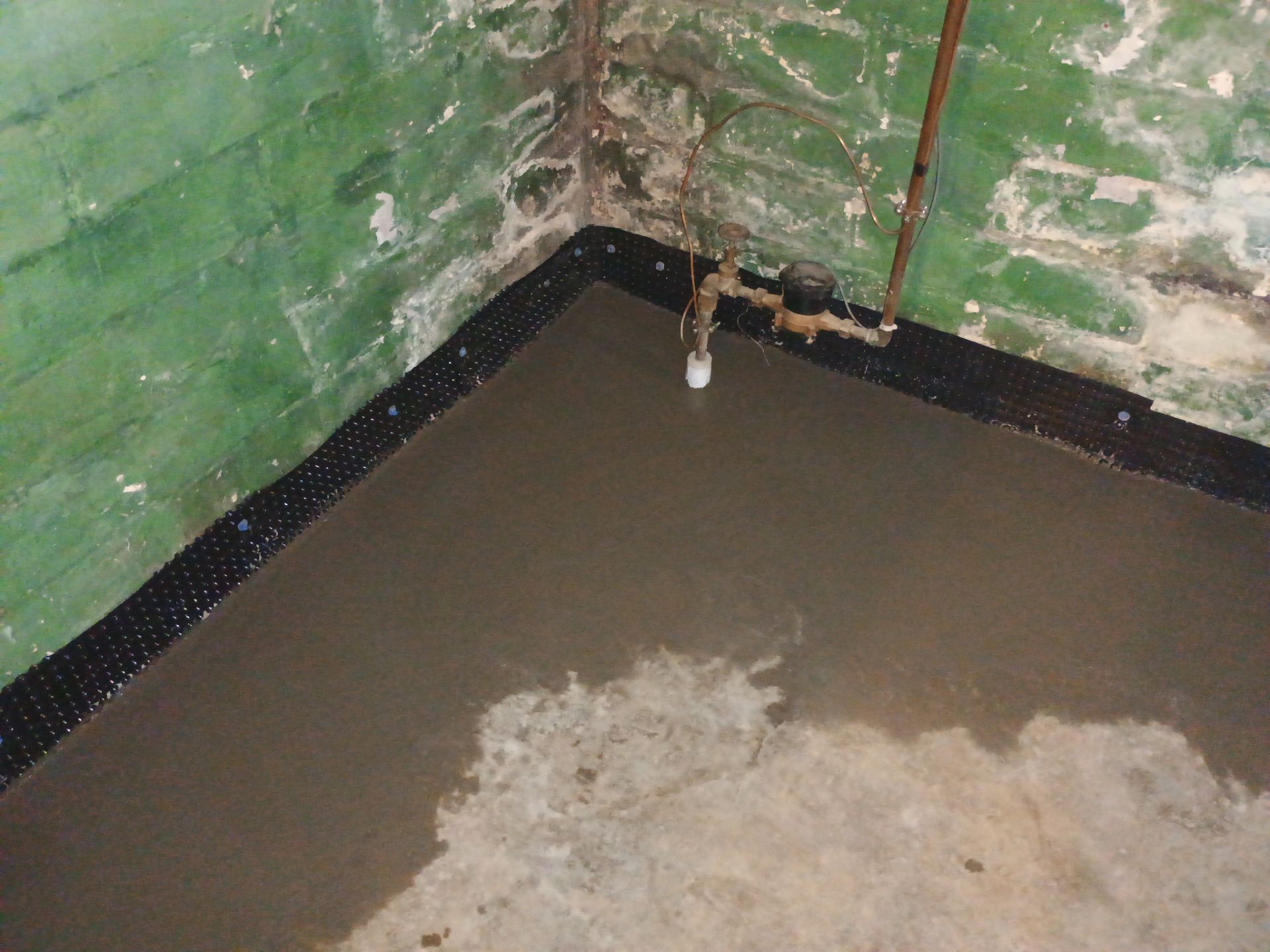 Interior Drain Tile for a South Minneapolis Basement by Waterproofing Northeast