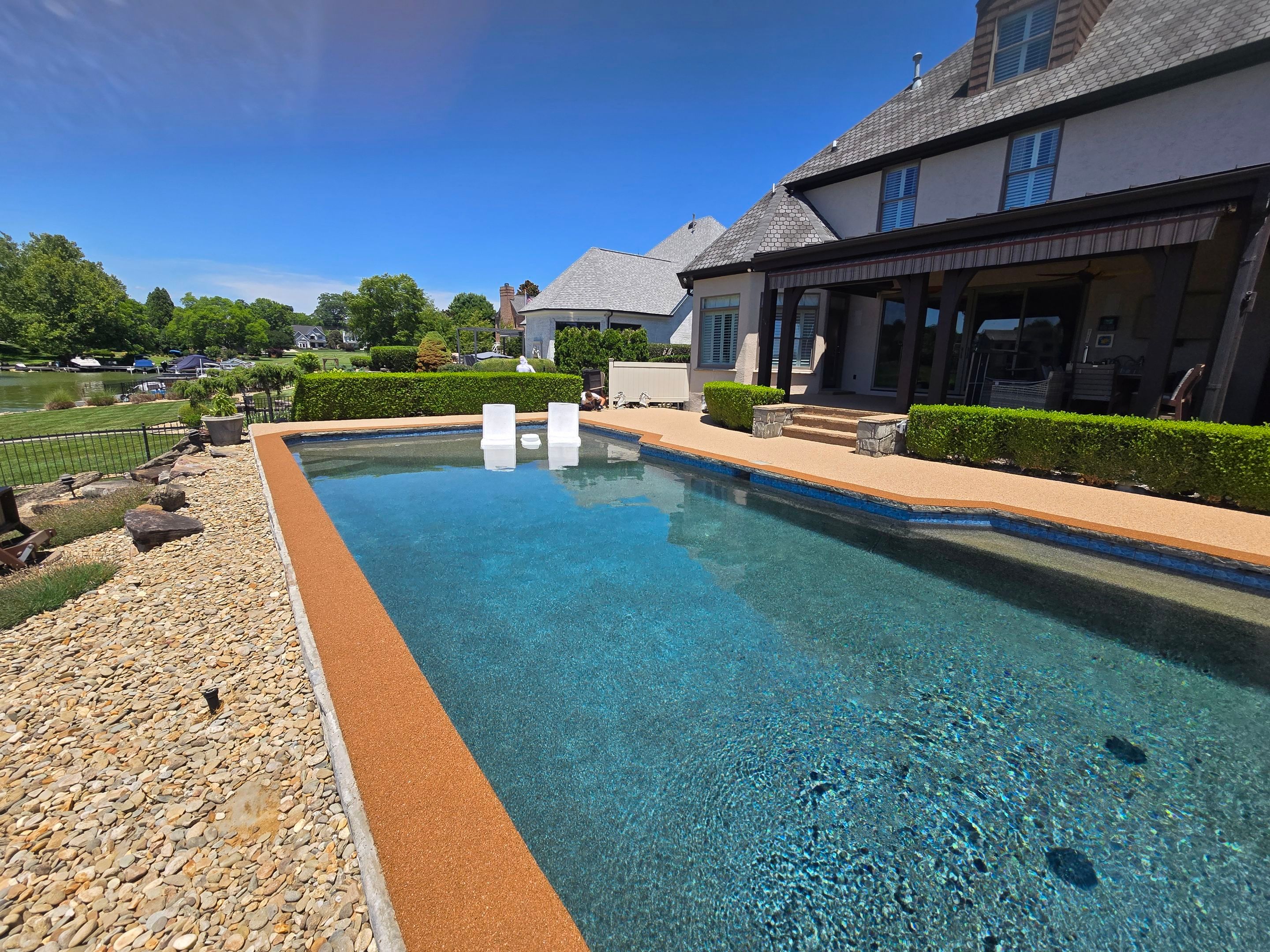 Lakeside Pool Resurface — Sandstone Rubaroc® with Medium Brown Border by Elite Floor Solutions