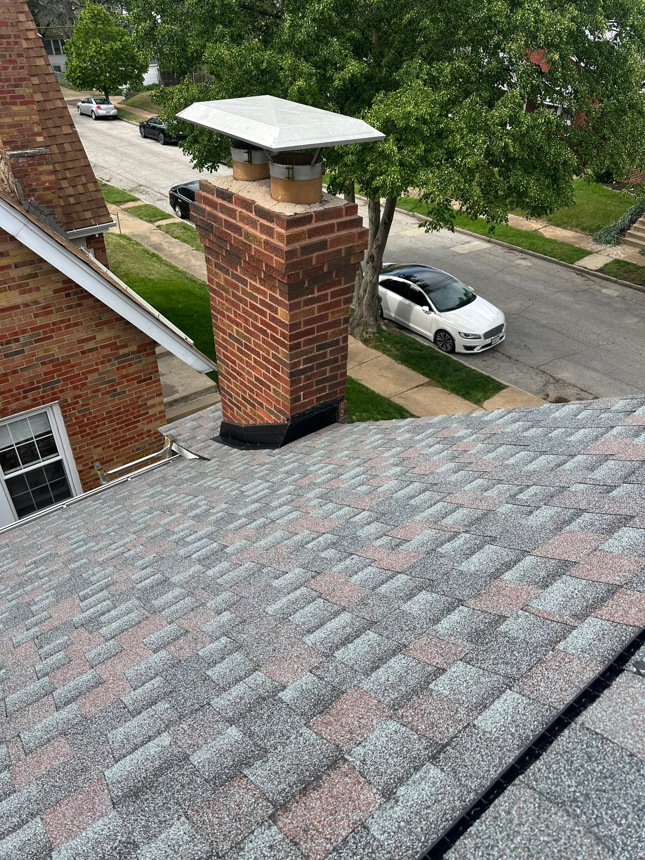 Full Residential Roof Installation and Detached Garage Shingle Replacement in St. Louis by Acute Roofing And Exteriors 