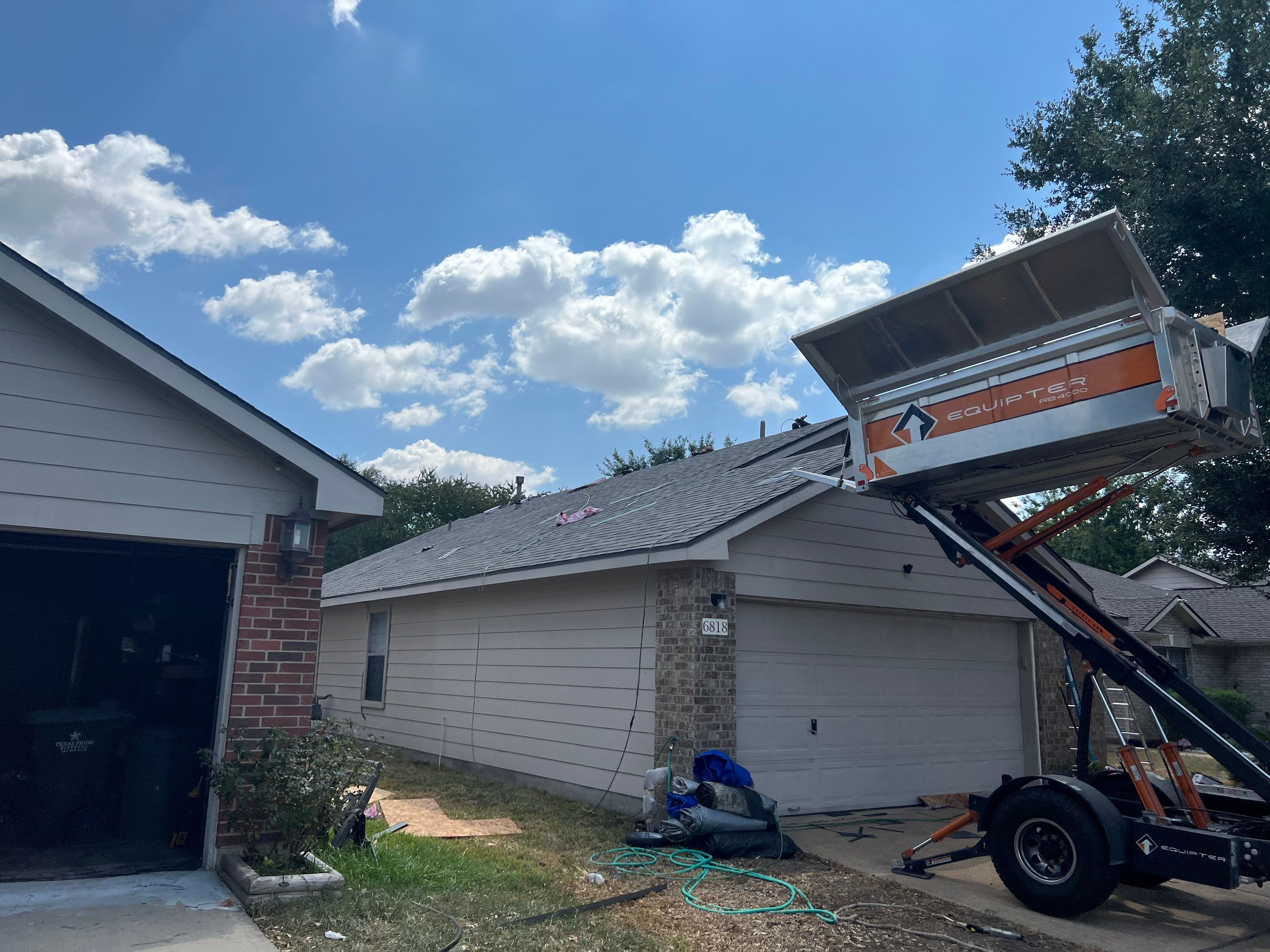 AMIG approved this roof for wind damage, fascia painting, and window work. by Roof Repair Company