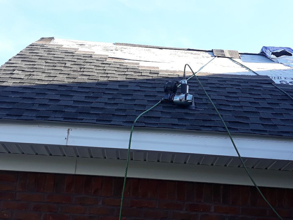 Residential Roofing Installation using Roof Replacement by American Roofing & Construction LLC