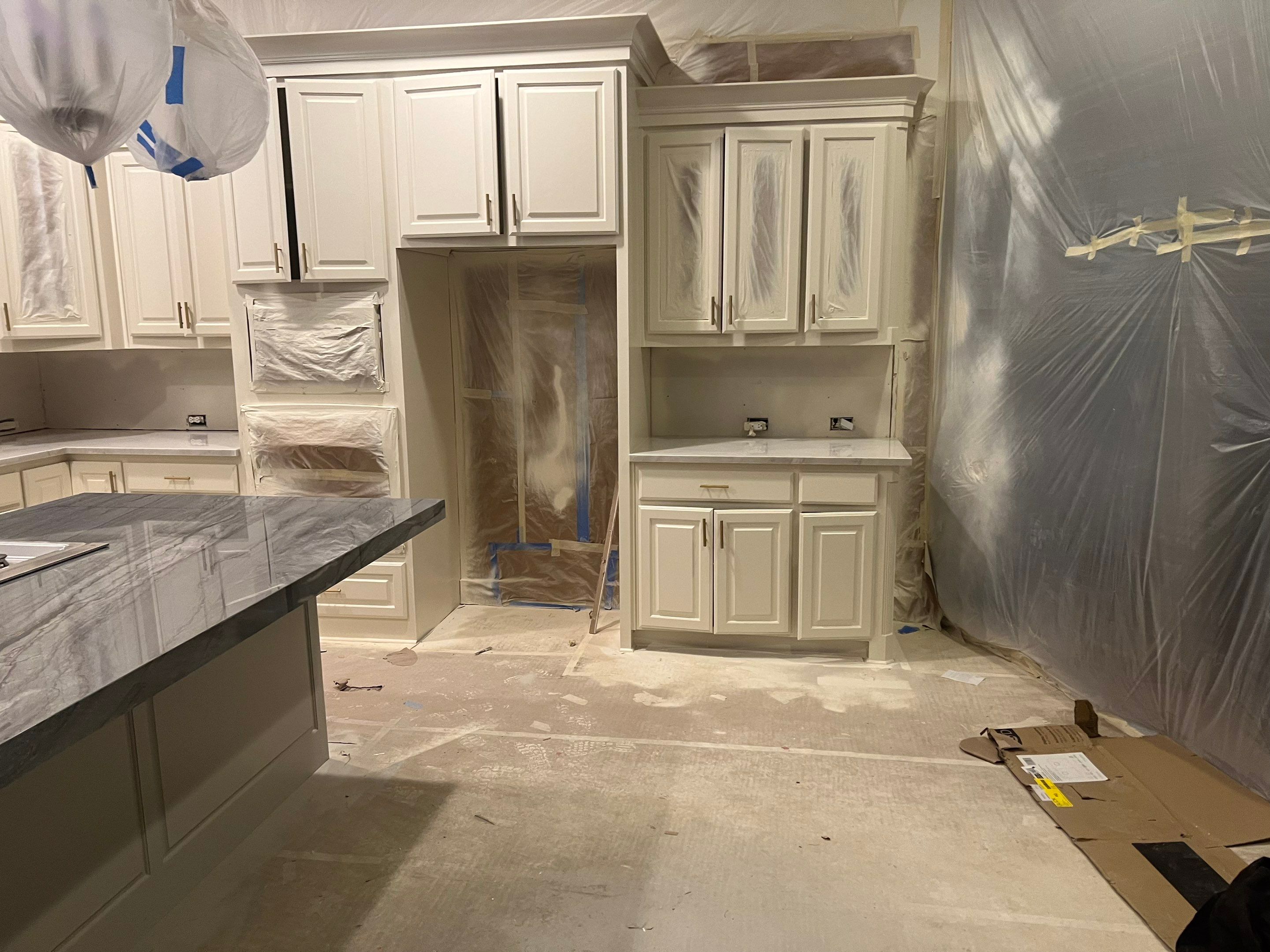 Kitchen Remodel using Quartzite by SLM General Contractors & Roofing