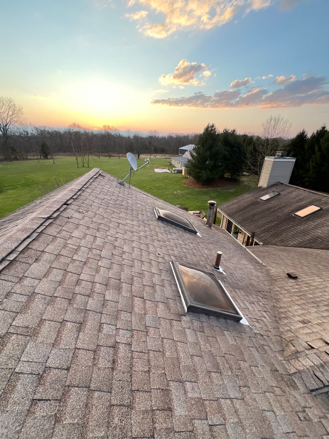 Residential Roofing Installation using Williamsburg Grey Duration Shingles by WIW Enterprises Inc