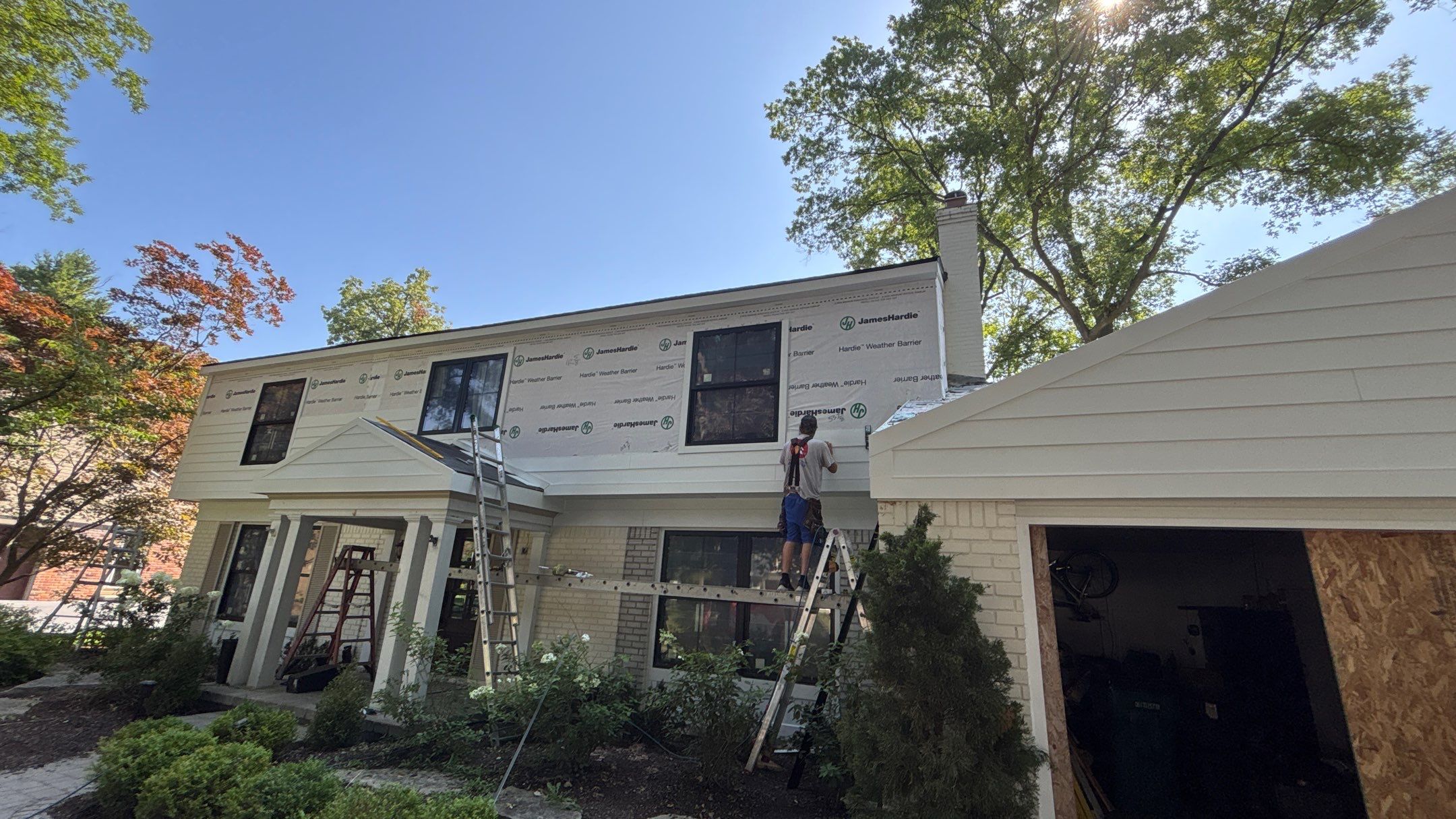 Siding Replacement using Hardie Plank S8 1/4"  Arctic White by 180 Contractors