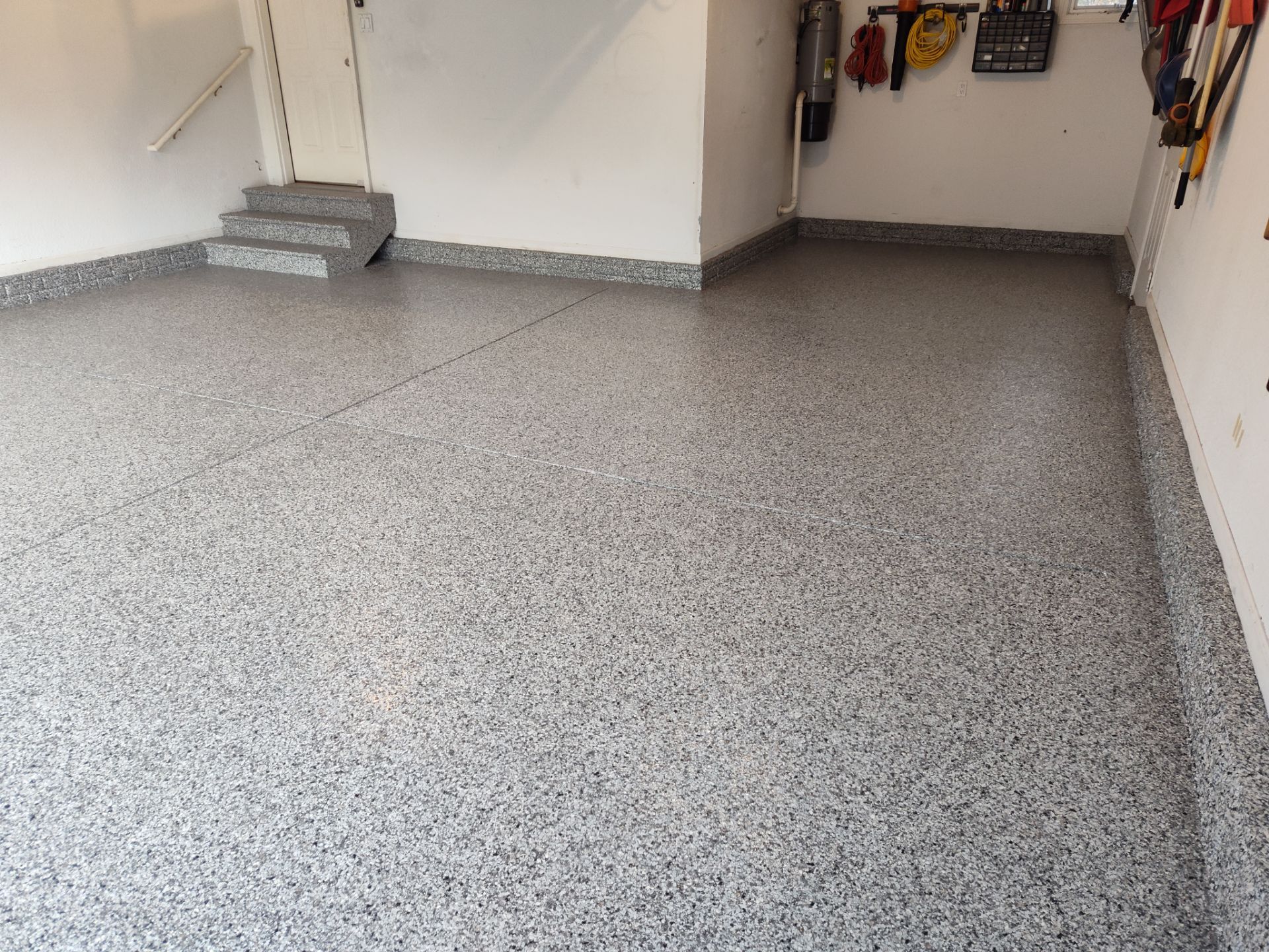 A Garage In One Day Keeps the Rock Salt Away! by Revival Concrete Coatings