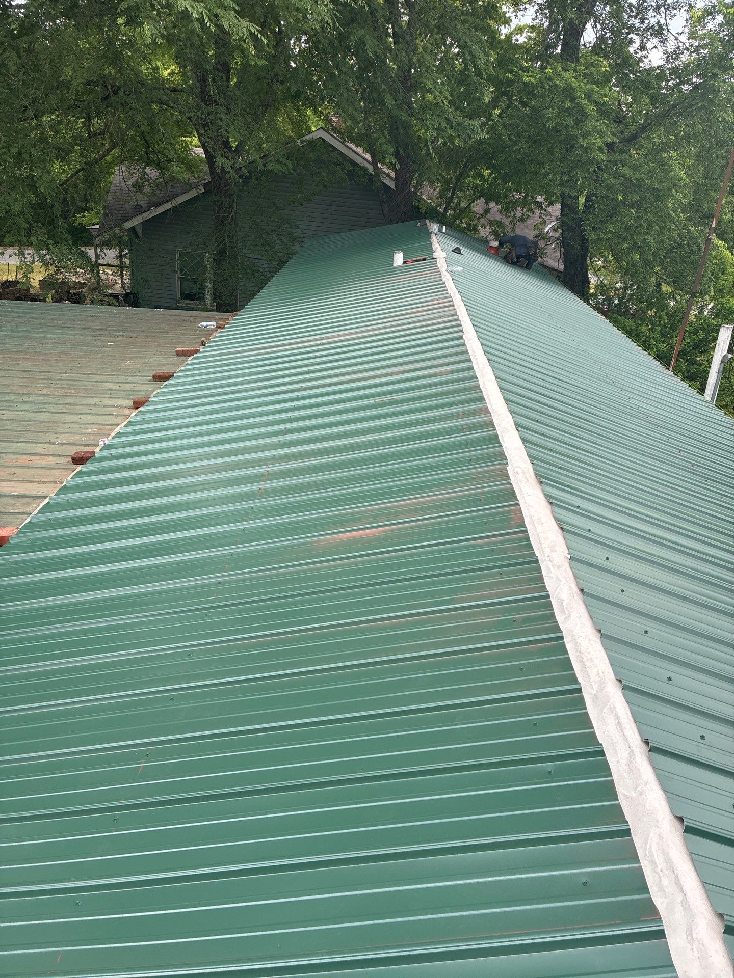 Metal roof installation by In & Out Construction & Remodeling, LLC
