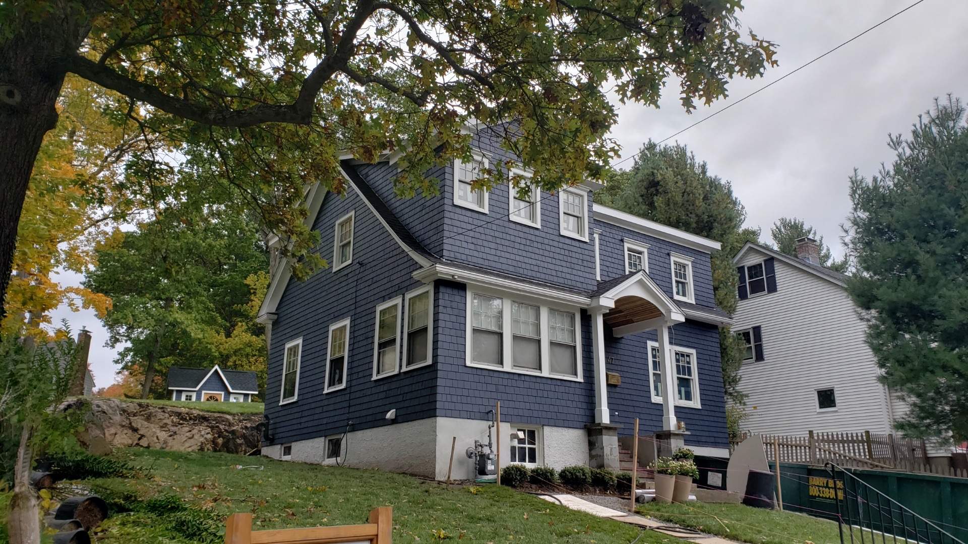 Siding Installation using Red Cedar by UBrothers Construction