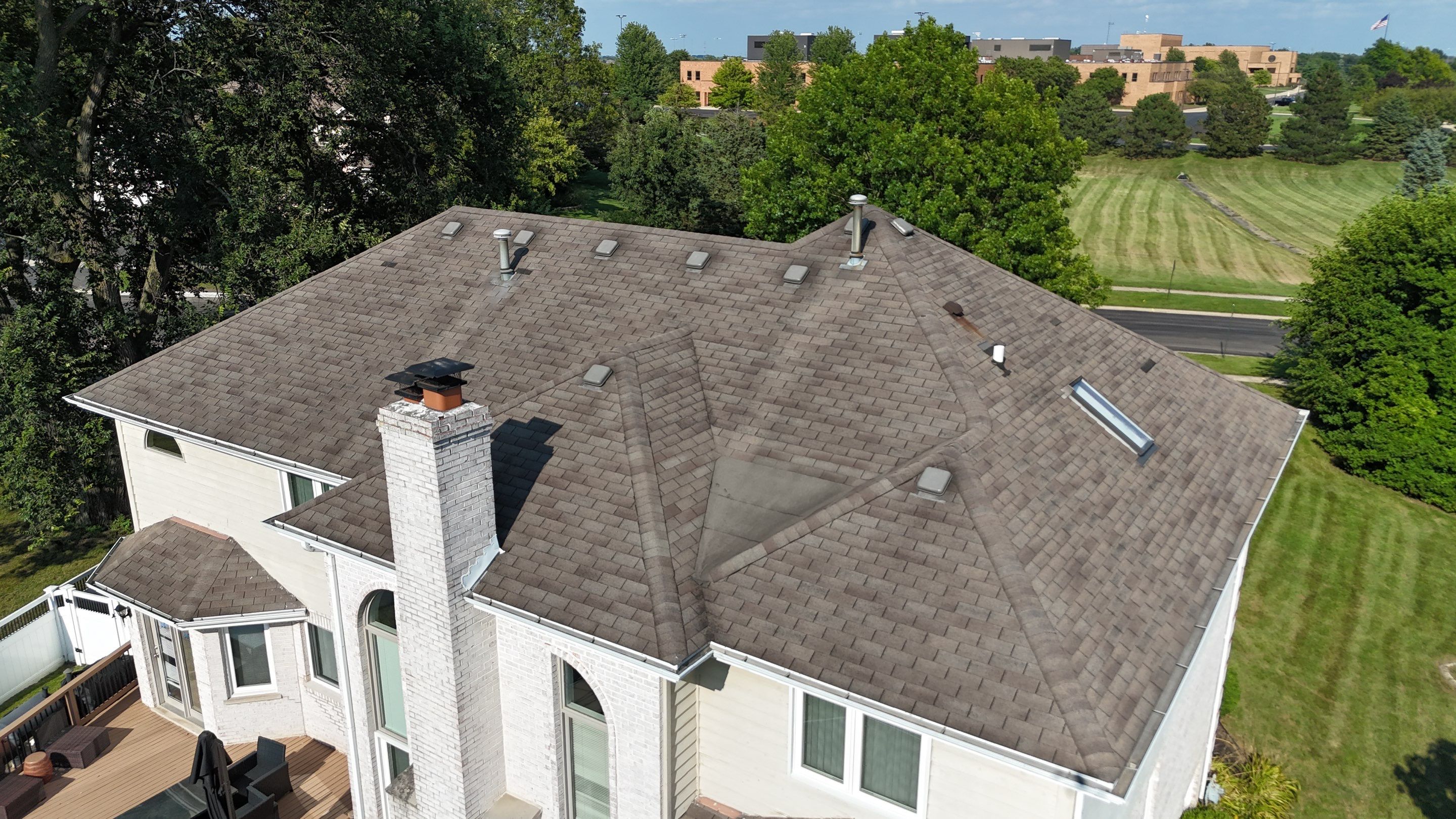 Roof and windows by Optimal Home Improvement 