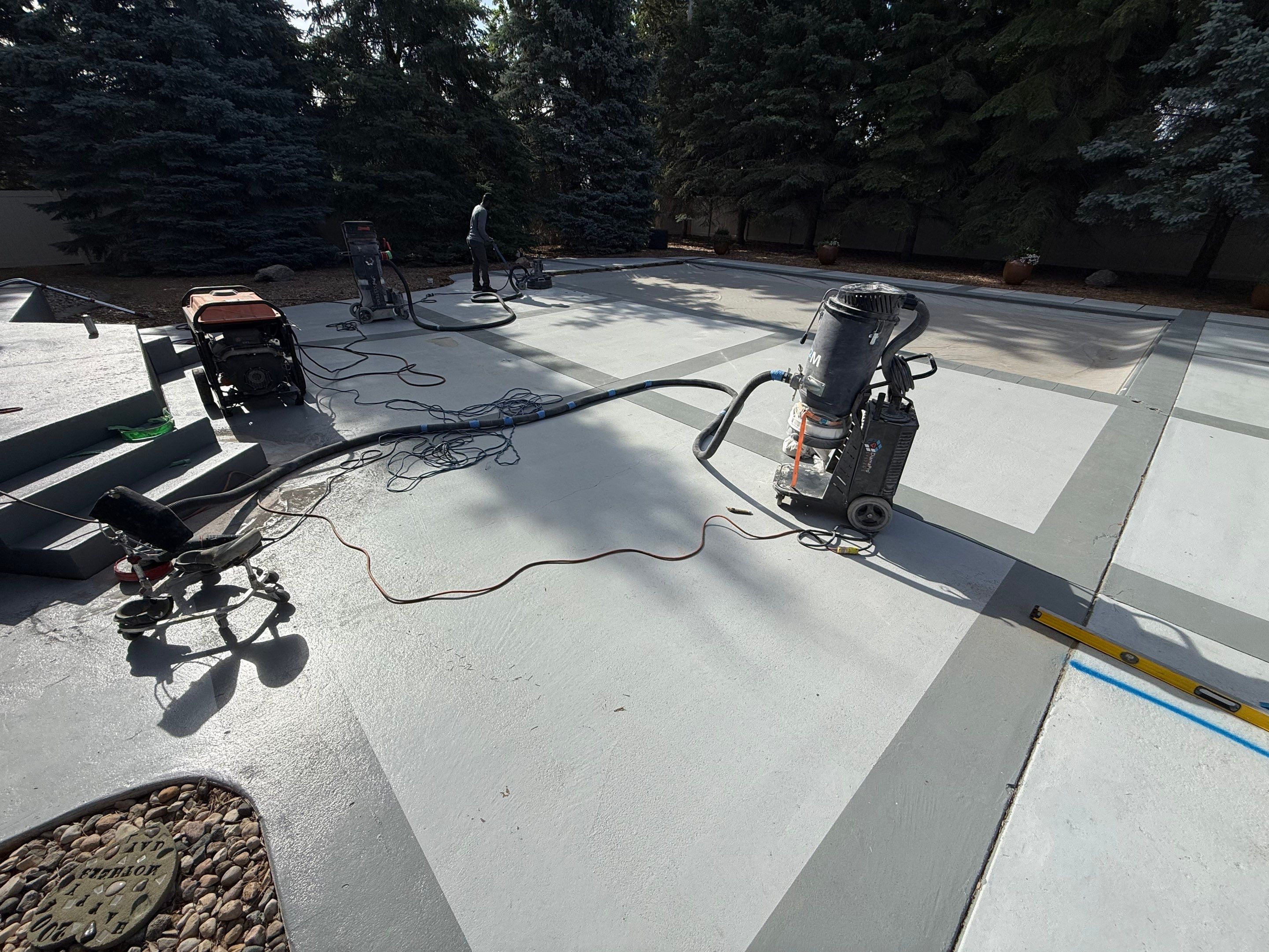 Decorative Concrete Pool Deck and Patio Resurfacing in Sioux Falls by Select Painting, Coatings & Garage Cabinets