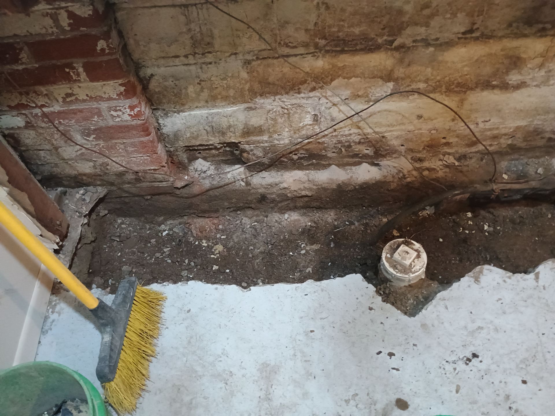 Interior Drain Tile & Sump Pump Installation in St. Paul, MN by Waterproofing Northeast