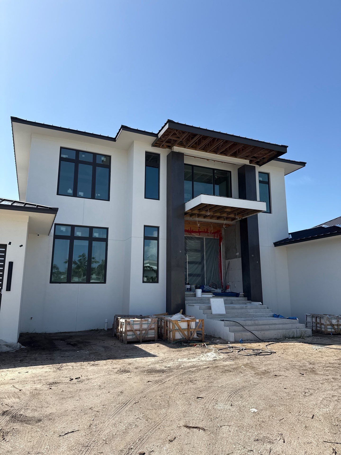 Seamless Aluminum Gutter Installation using black seamless gutters in Sarasota FL by Gutter Professors