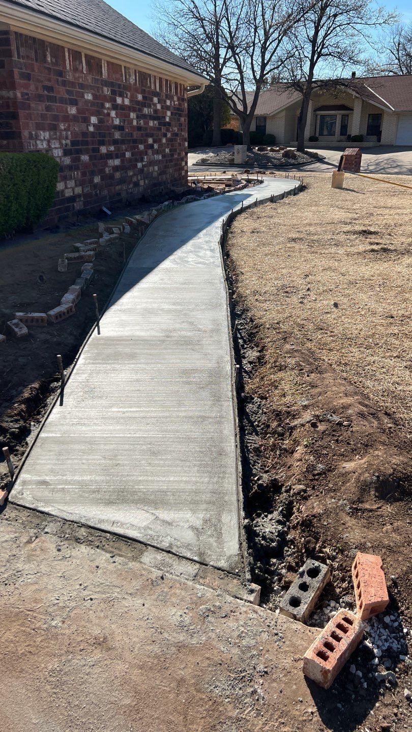 Concrete sidewalk using Concrete by Clays Services Inc