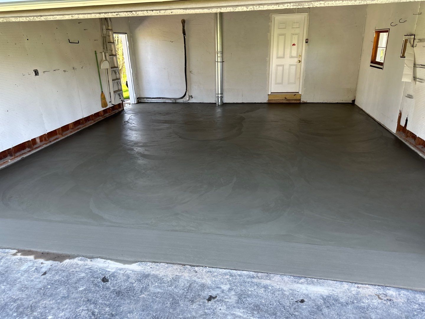 Concrete garage floor replacement by NG Masonry & Construction LLC