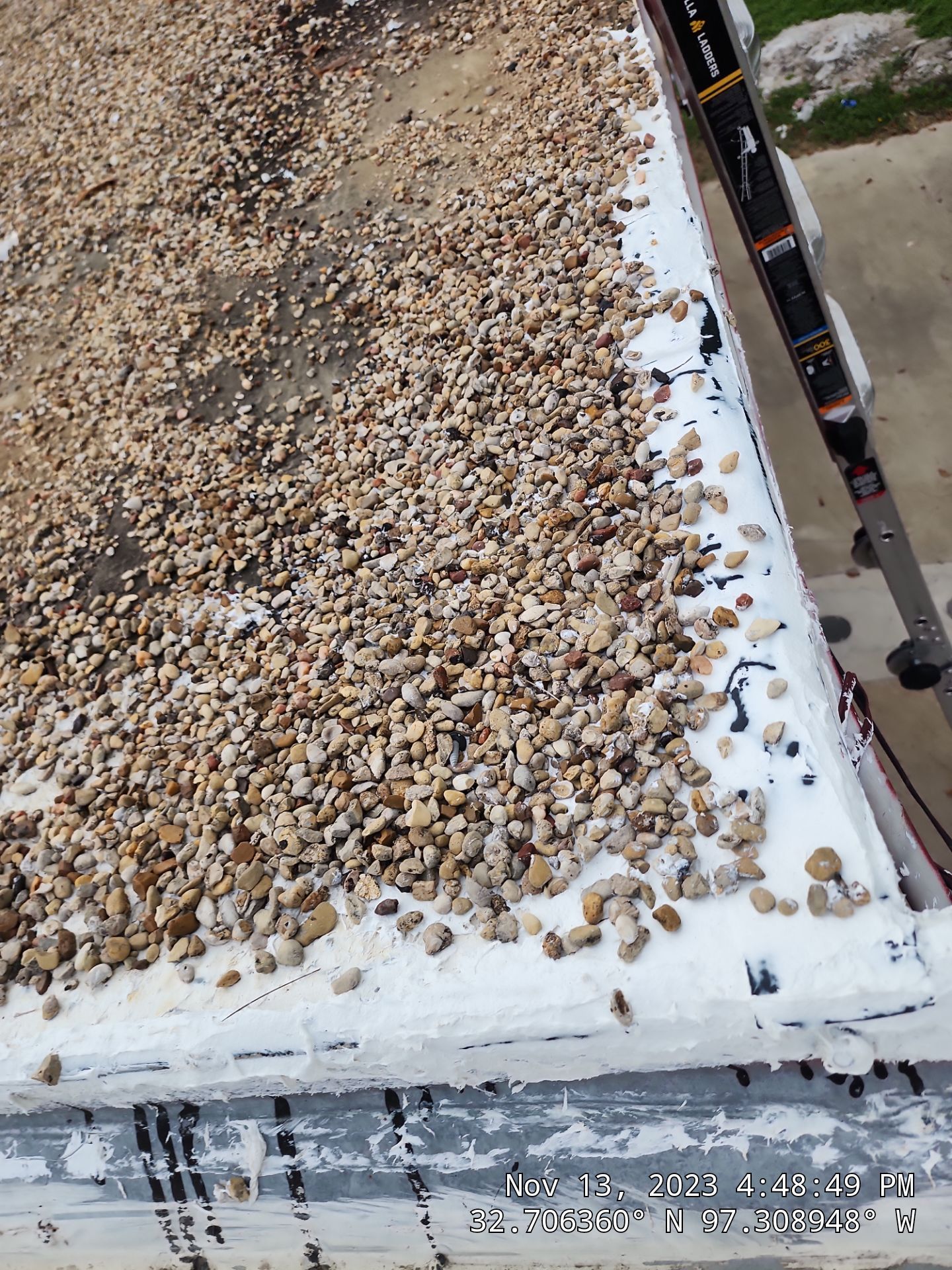 Commercial roofing overlay using GAF TPO over an old ballast roof by Becker Roofing and Exteriors