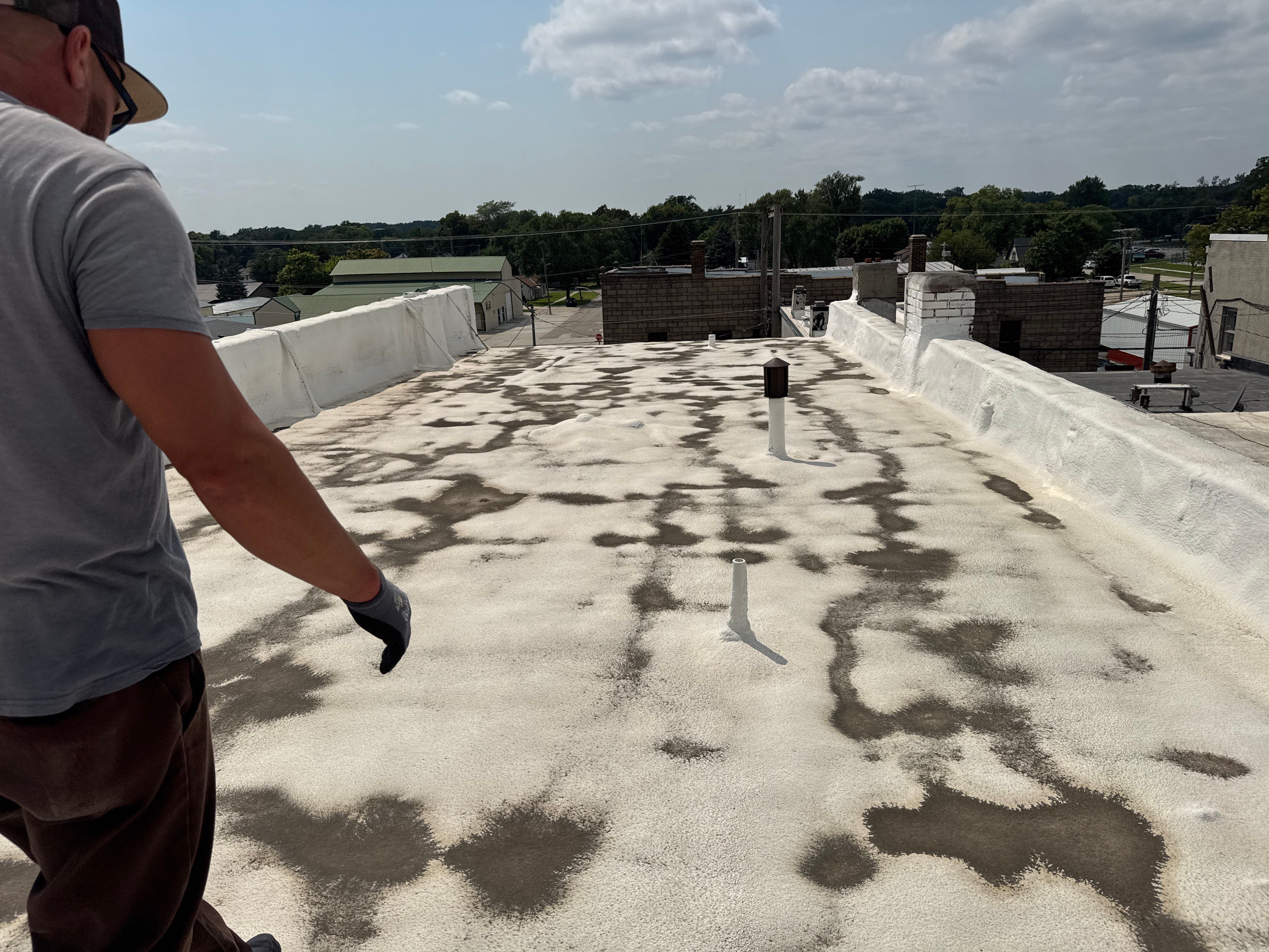 Commercial Flat Roof Elastomeric Coating and Repair in West Point by Crows Roofing LLC
